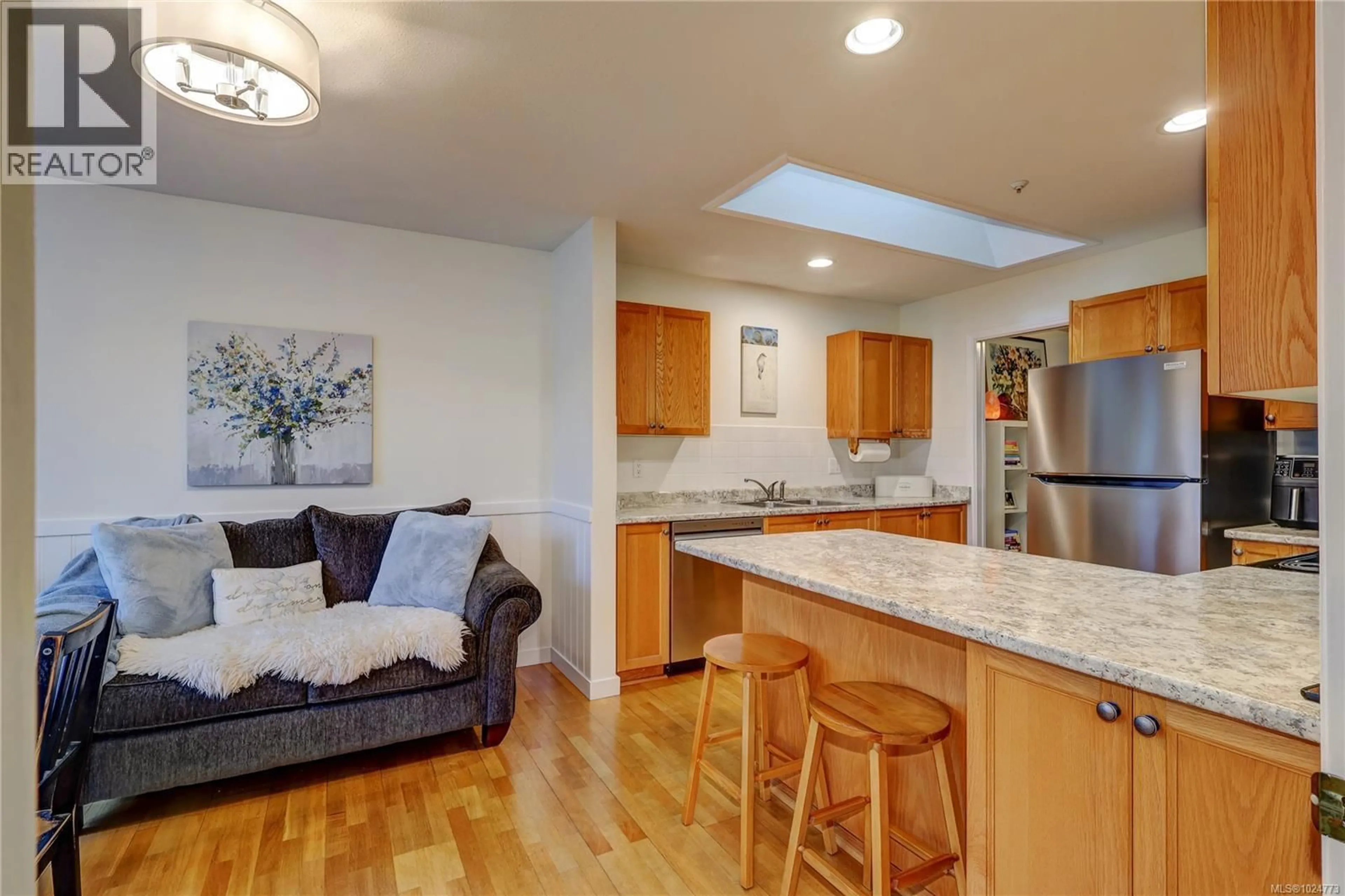 Open concept kitchen, wood/laminate floor for 5959 WATERTON DRIVE, Nanaimo British Columbia V9T6A9