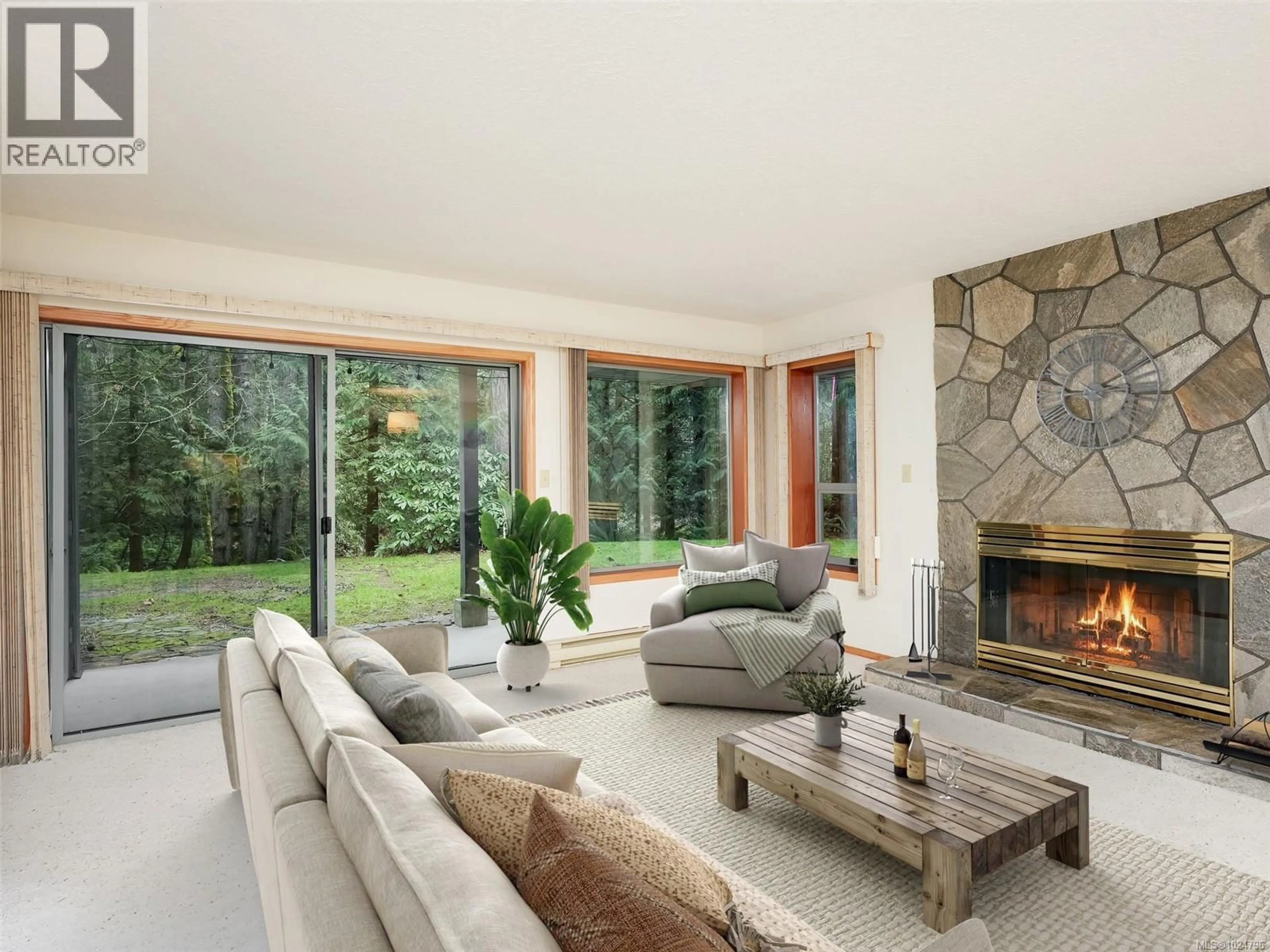 Living room with furniture, unknown for 1829 LANDS END ROAD, North Saanich British Columbia V8L5J2