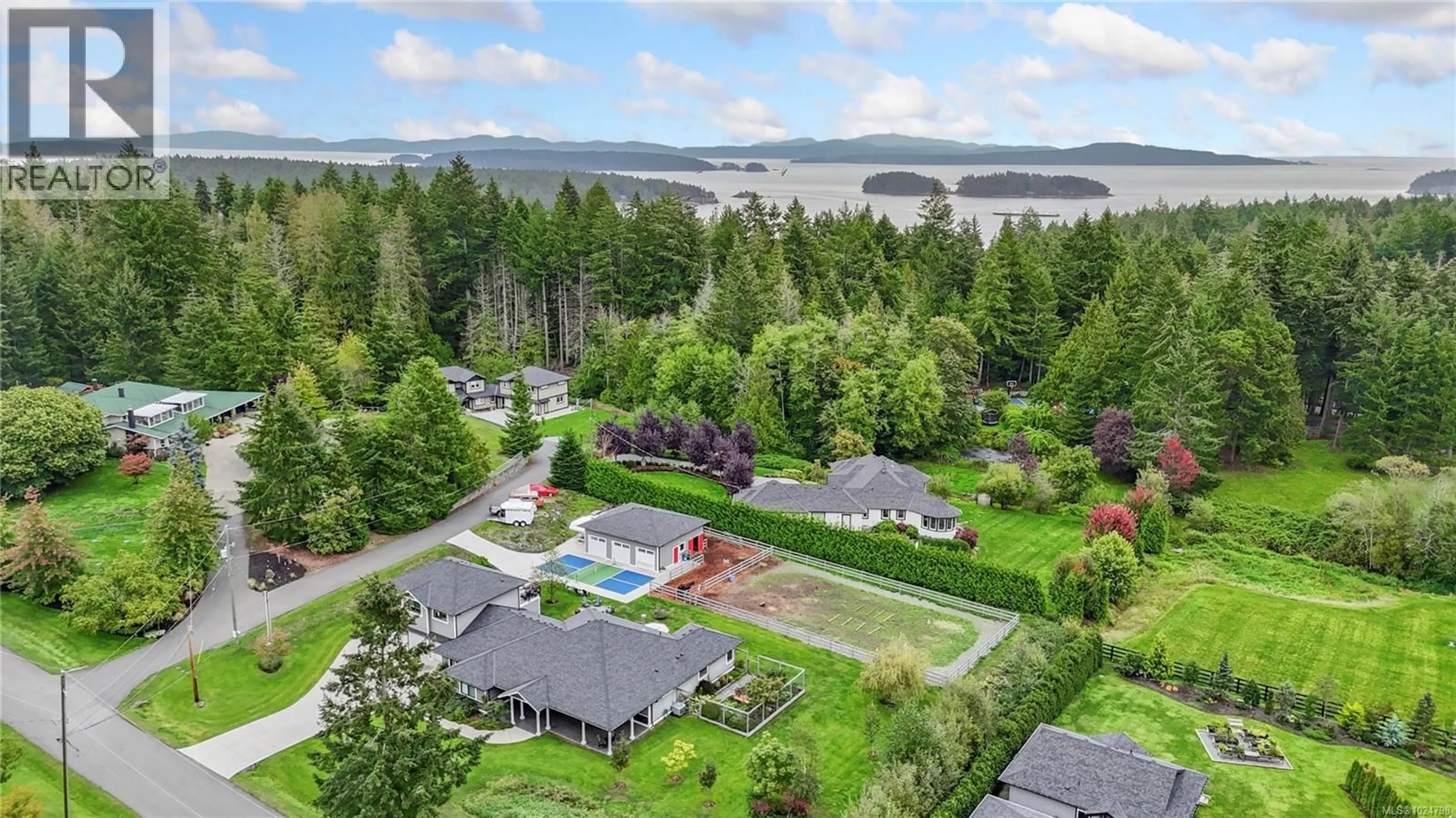 A pic from outside/outdoor area/front of a property/back of a property/a pic from drone, water/lake/river/ocean view for 11329 HUMMINGBIRD PLACE, North Saanich British Columbia V8L5S3