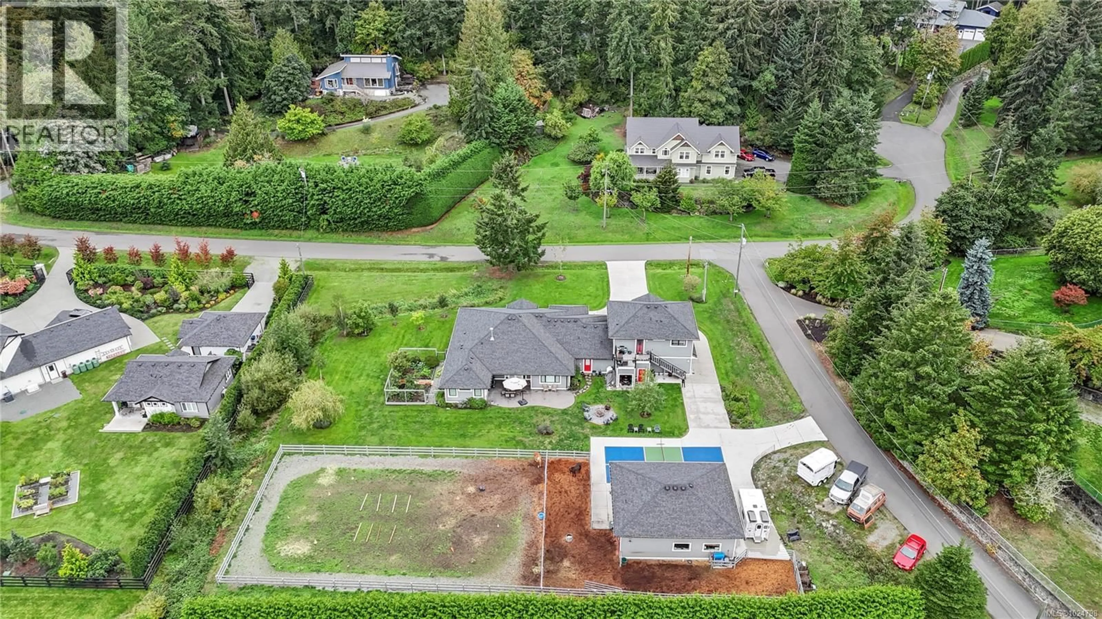 A pic from outside/outdoor area/front of a property/back of a property/a pic from drone, street for 11329 HUMMINGBIRD PLACE, North Saanich British Columbia V8L5S3