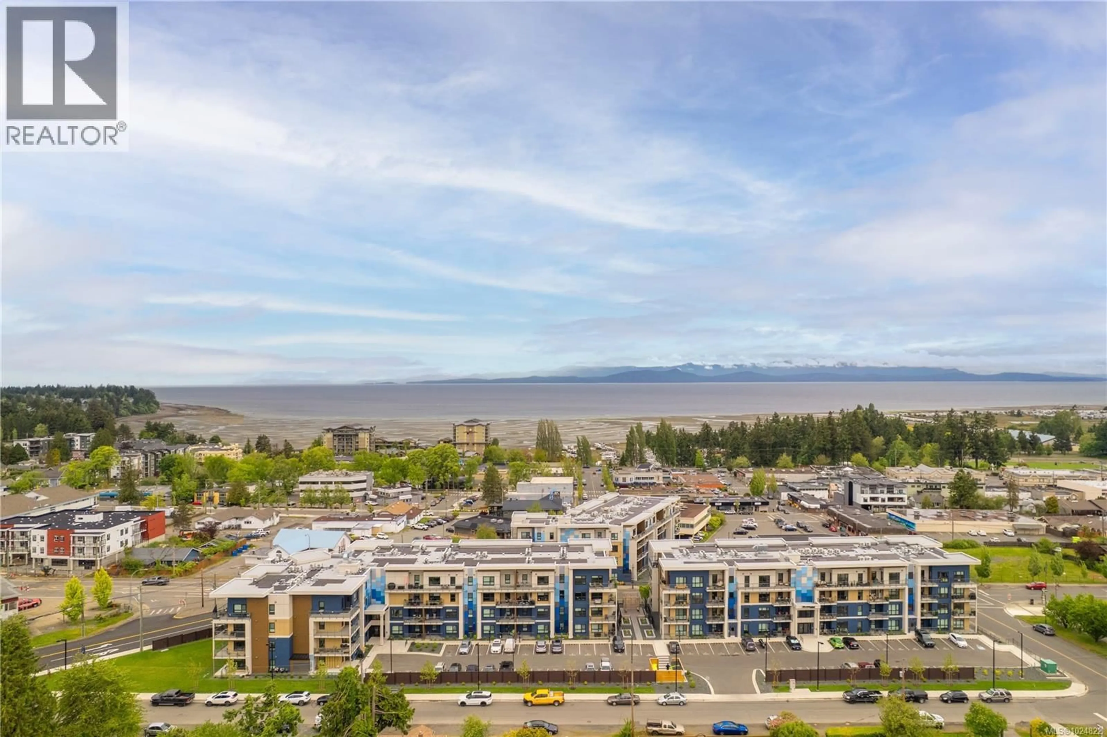 A pic from outside/outdoor area/front of a property/back of a property/a pic from drone, water/lake/river/ocean view for 212 - 140 JENSEN AVENUE WEST, Parksville British Columbia V9P0H7