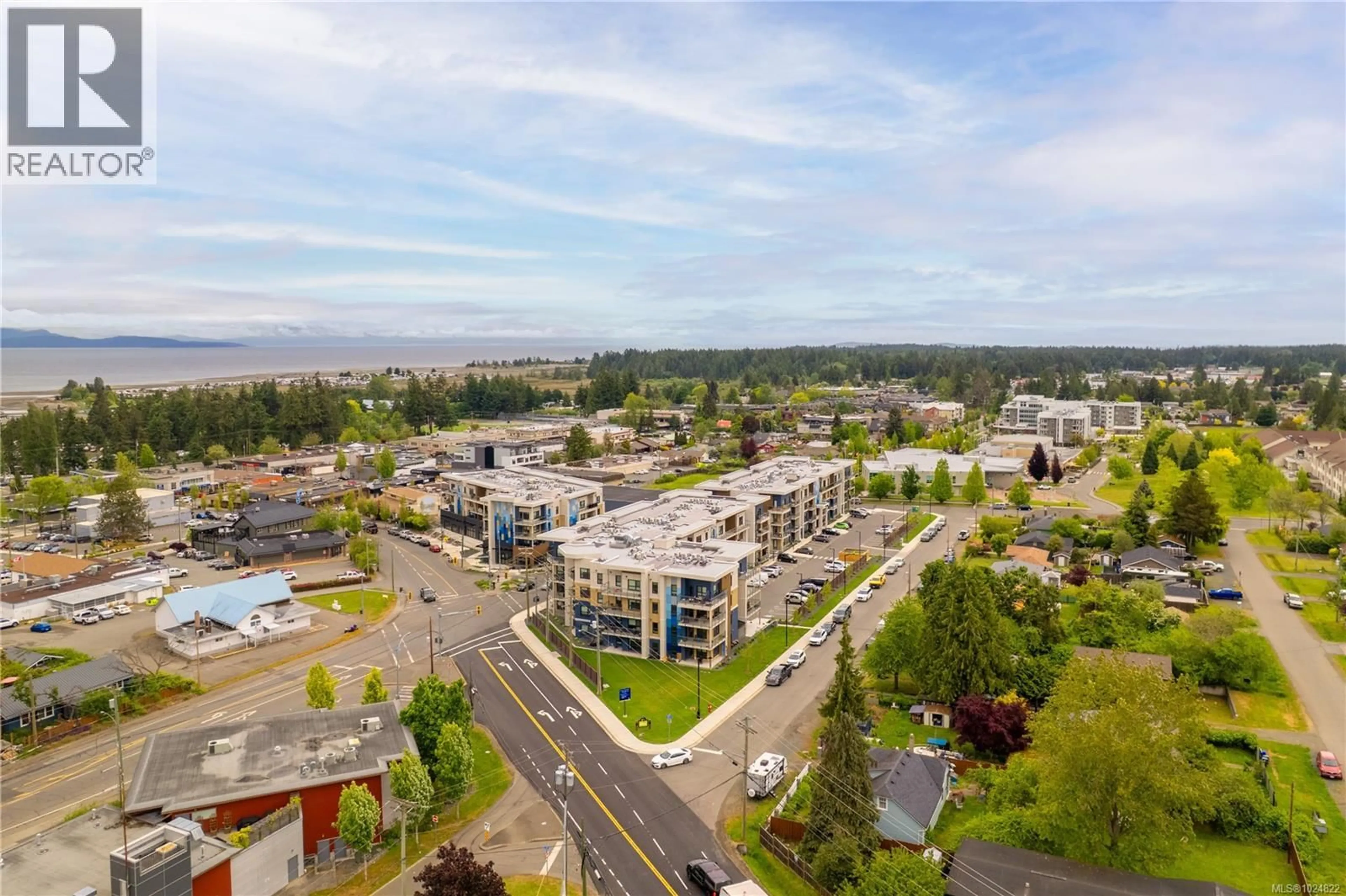 A pic from outside/outdoor area/front of a property/back of a property/a pic from drone, mountain view for 212 - 140 JENSEN AVENUE WEST, Parksville British Columbia V9P0H7