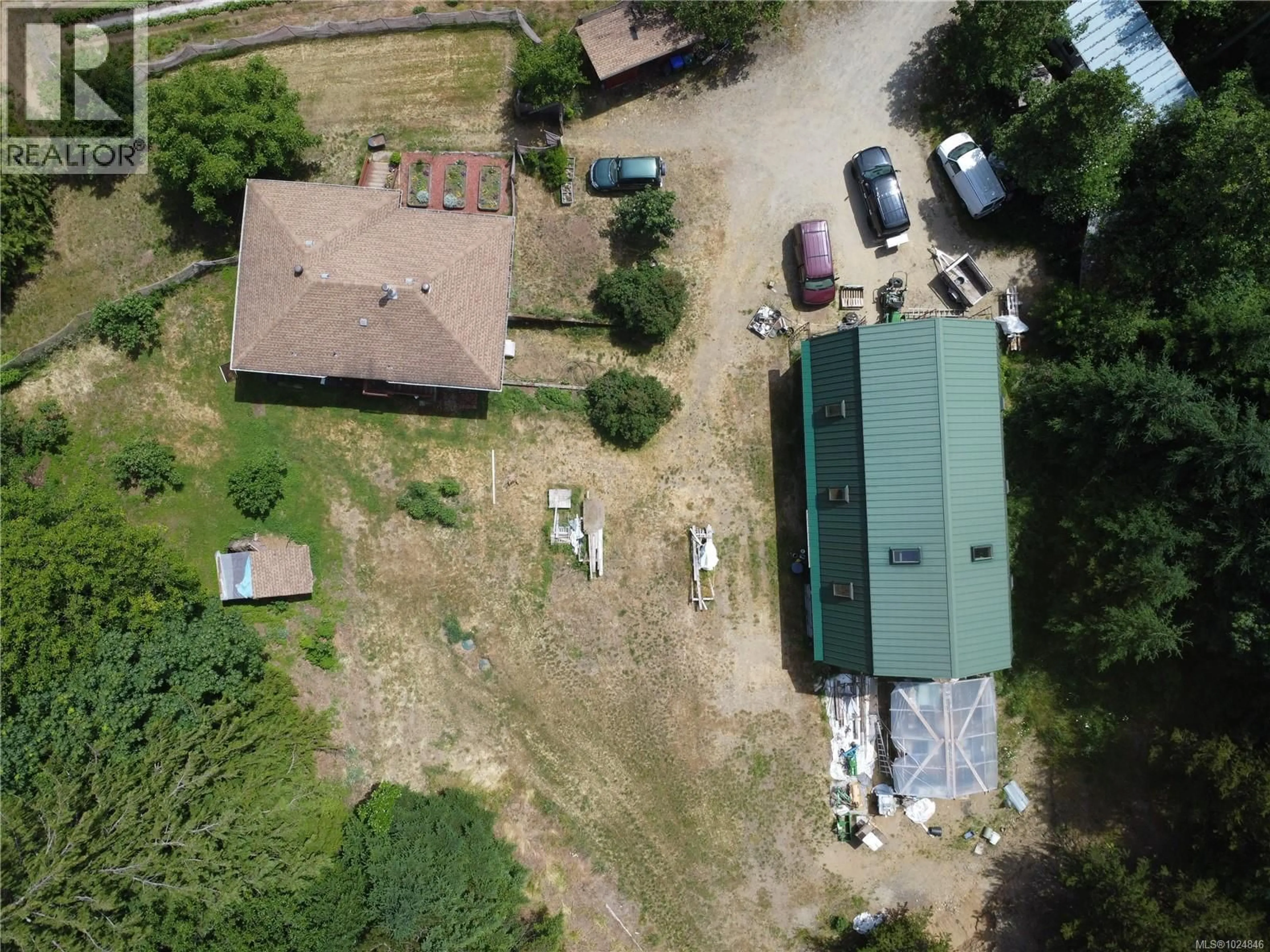 A pic from outside/outdoor area/front of a property/back of a property/a pic from drone, building for 1075 SPIDER LAKE ROAD, Qualicum Beach British Columbia V9K2L7