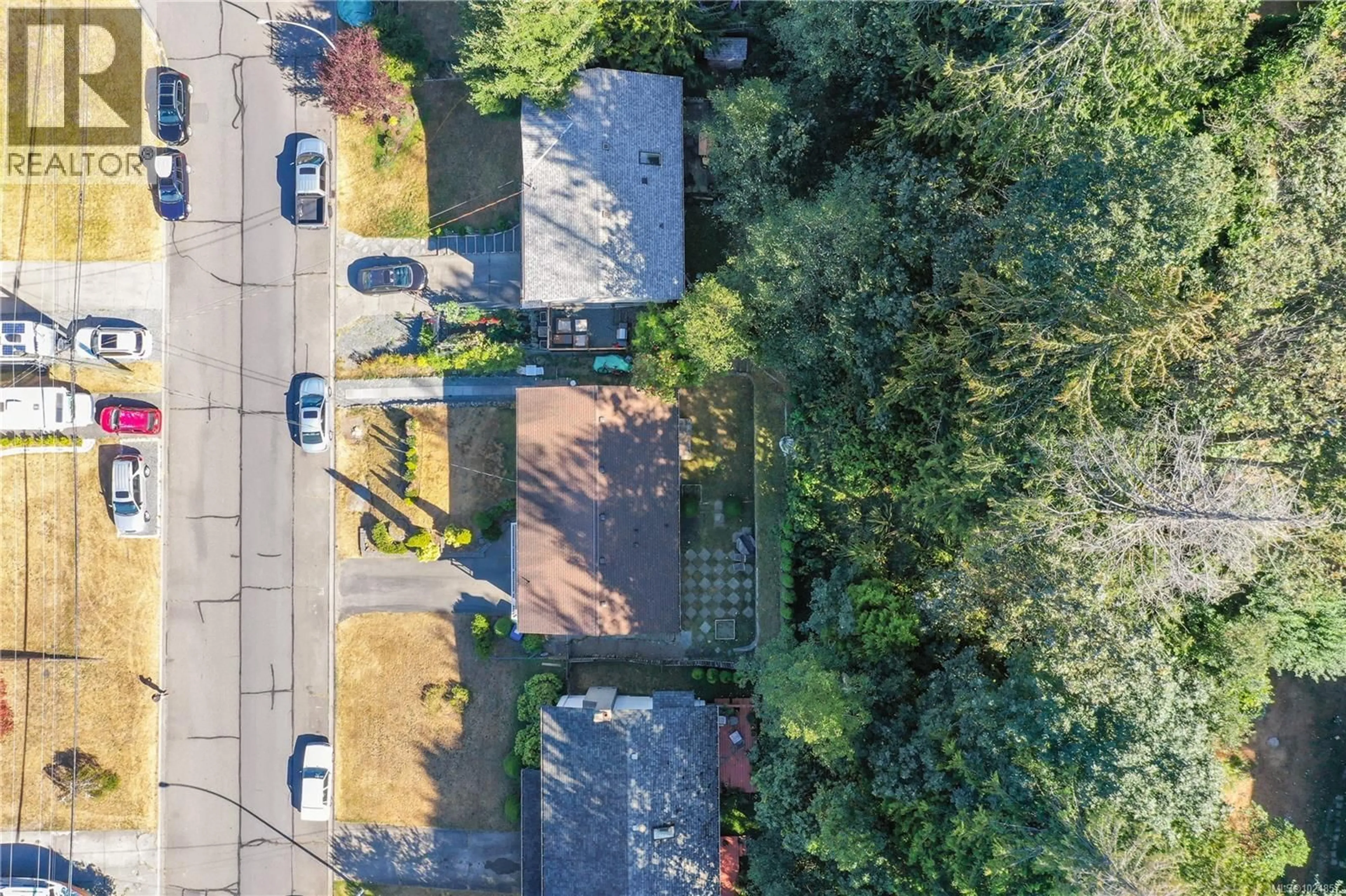 A pic from outside/outdoor area/front of a property/back of a property/a pic from drone, street for 5723 BROOKWOOD DRIVE, Nanaimo British Columbia V9T5P3