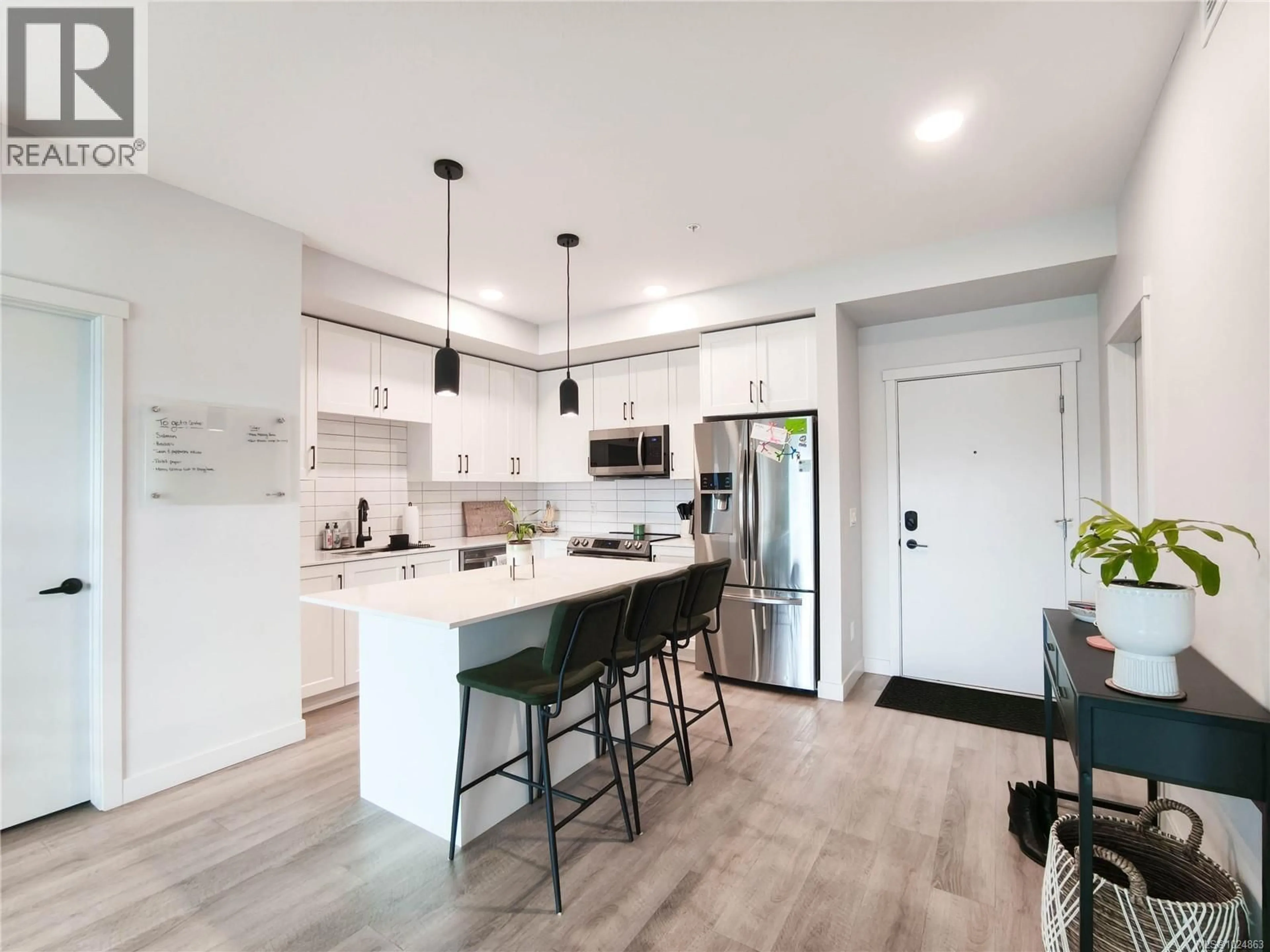 Open concept kitchen, unknown for 511 - 2465 GATEWAY ROAD, Langford British Columbia V9B6R1