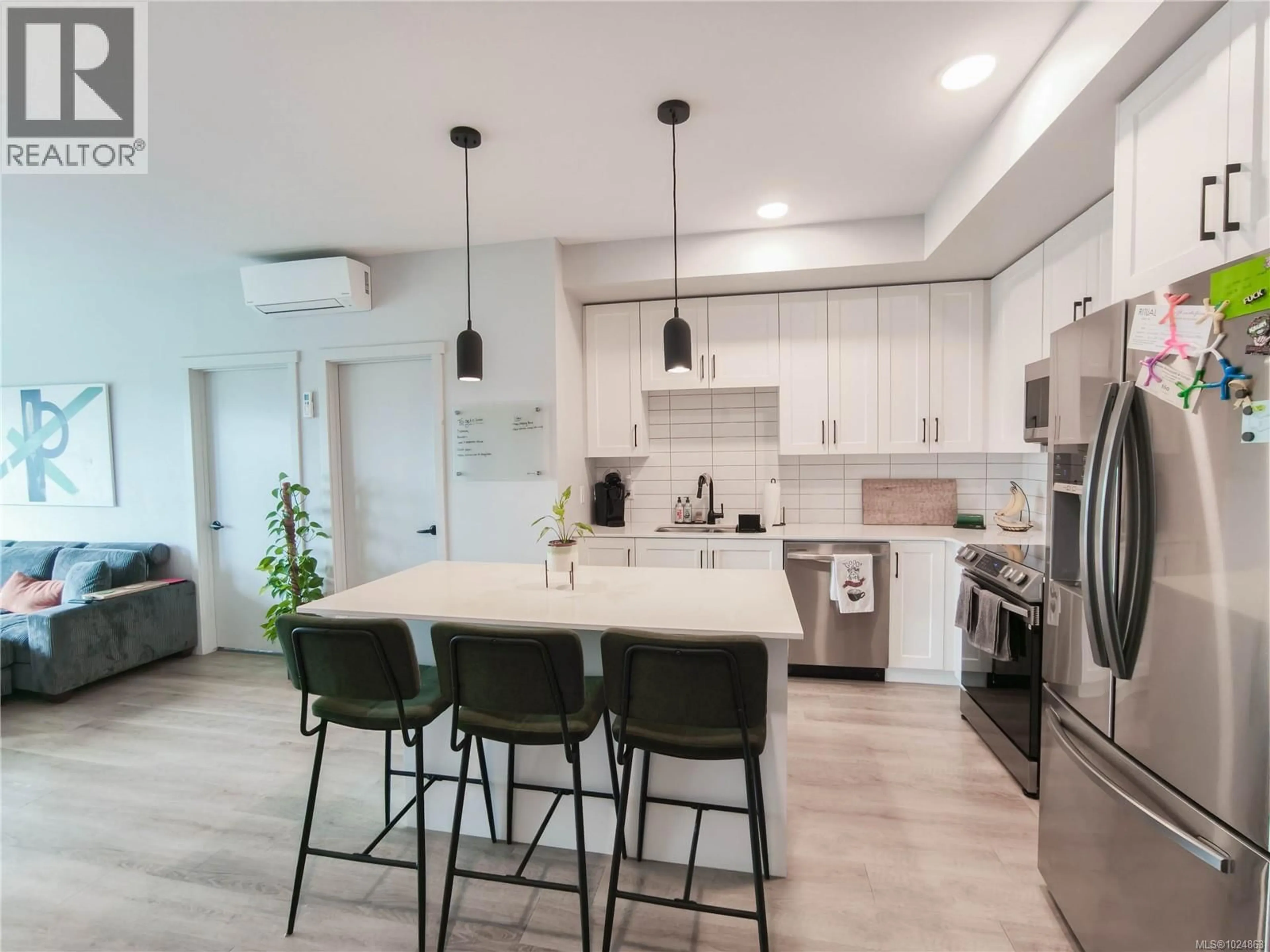 Open concept kitchen, ceramic/tile floor for 511 - 2465 GATEWAY ROAD, Langford British Columbia V9B6R1