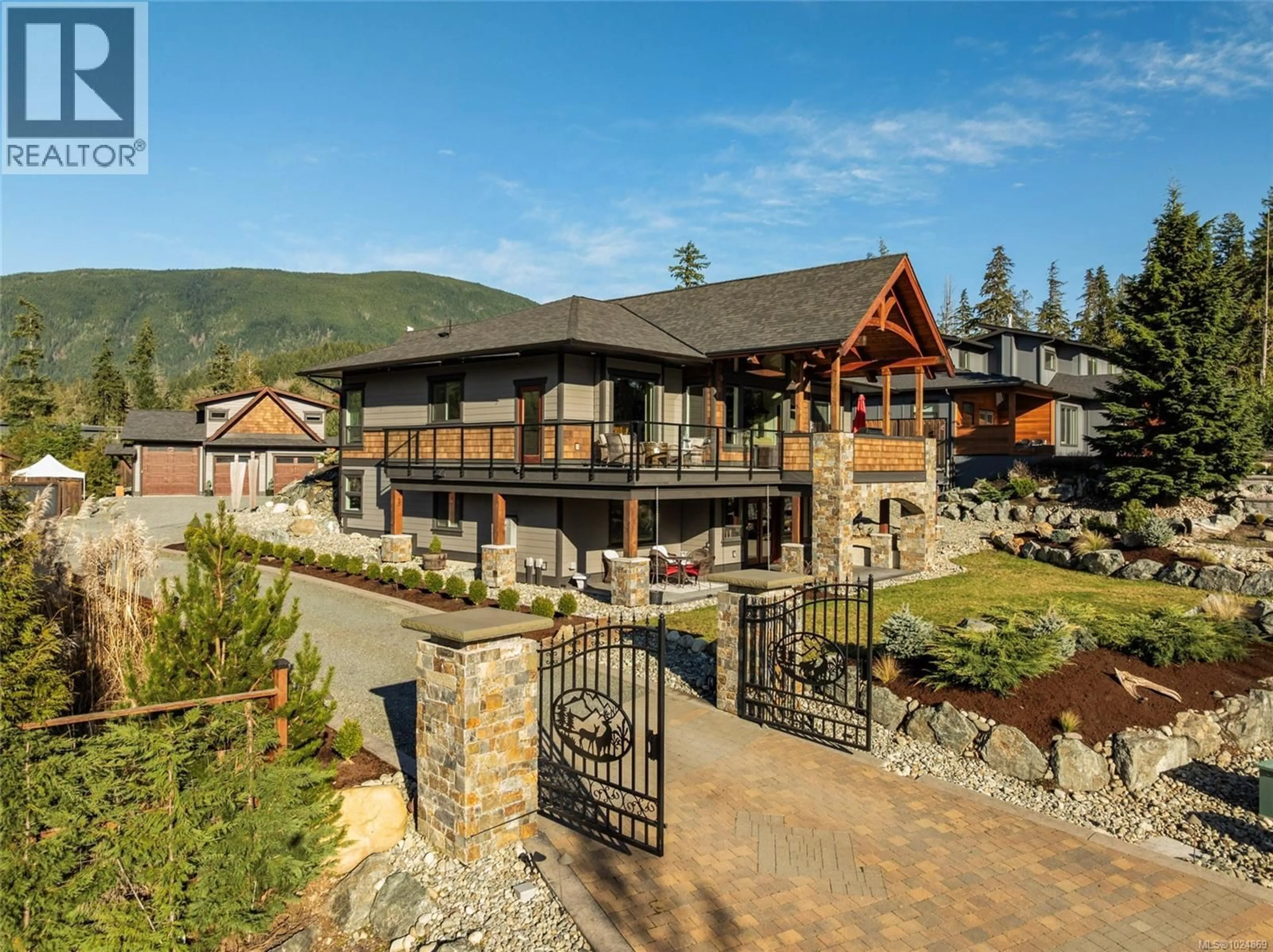 A pic from outside/outdoor area/front of a property/back of a property/a pic from drone, mountain view for 7343 LAKEFRONT PLACE, Lake Cowichan British Columbia V0R2G1