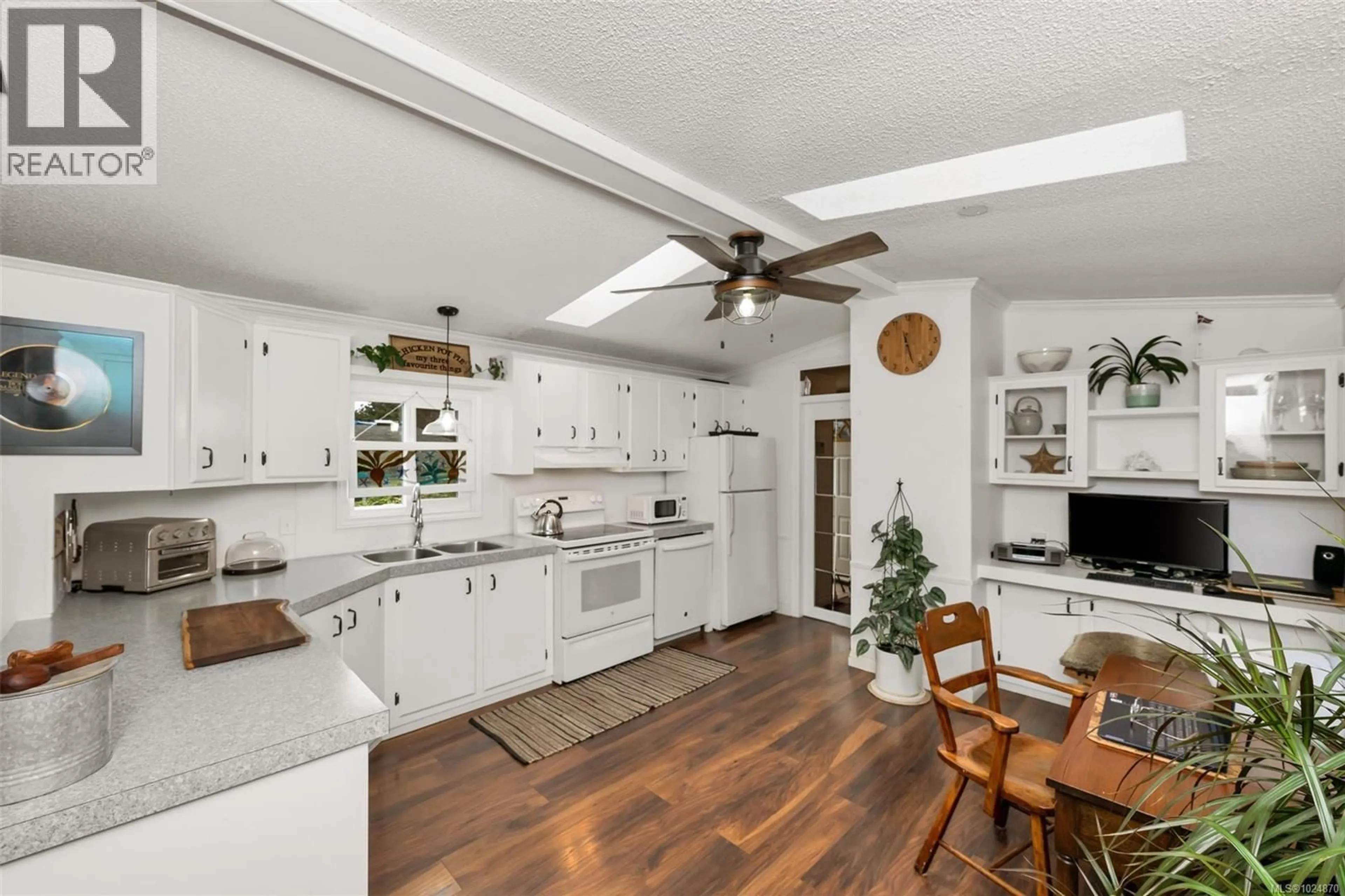 Open concept kitchen, unknown for 222 - 2779 STAUTW ROAD, Central Saanich British Columbia V8M2C8