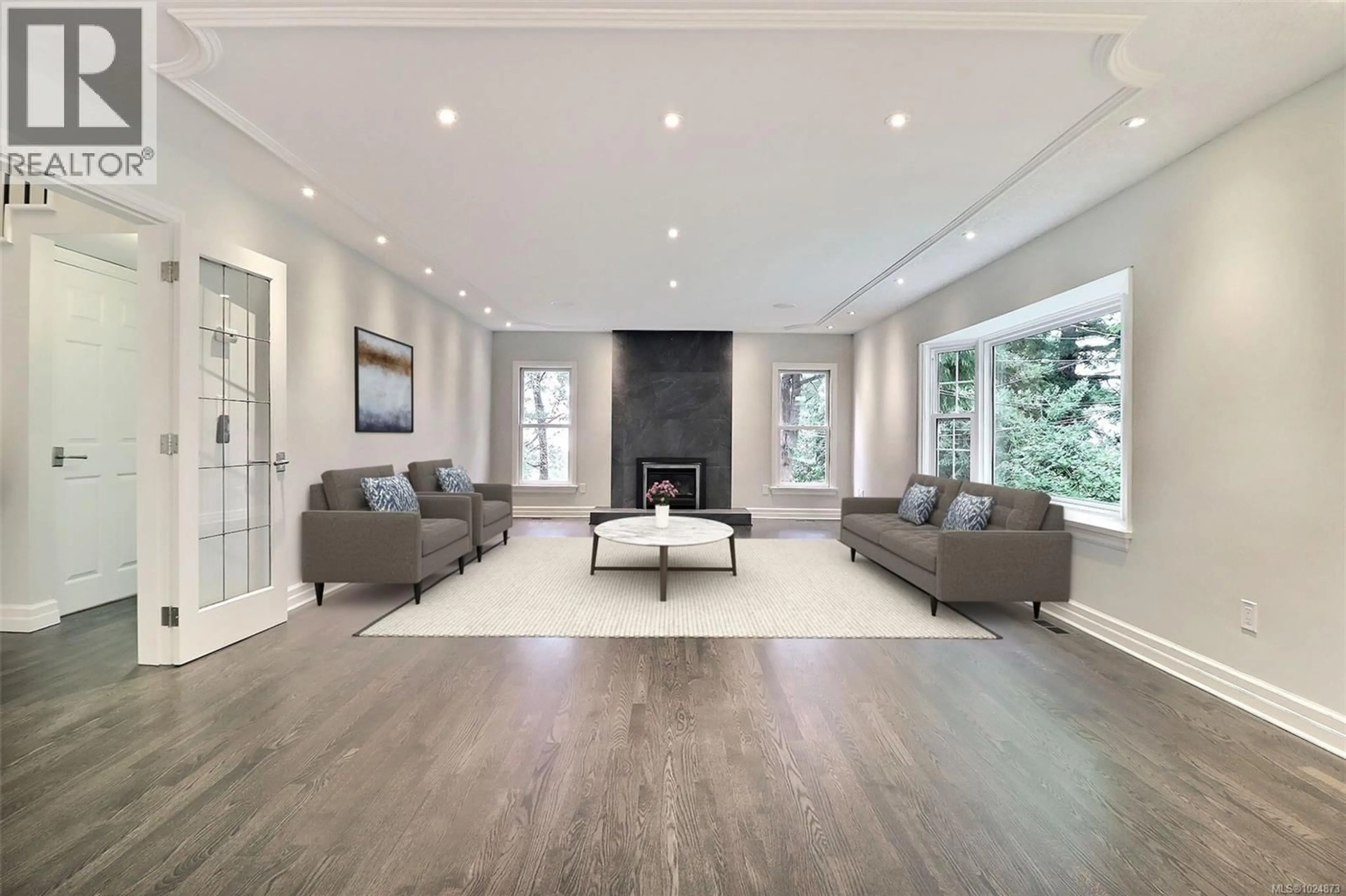 Living room with furniture, wood/laminate floor for 3977 LEXINGTON AVENUE, Saanich British Columbia V8N3Z5