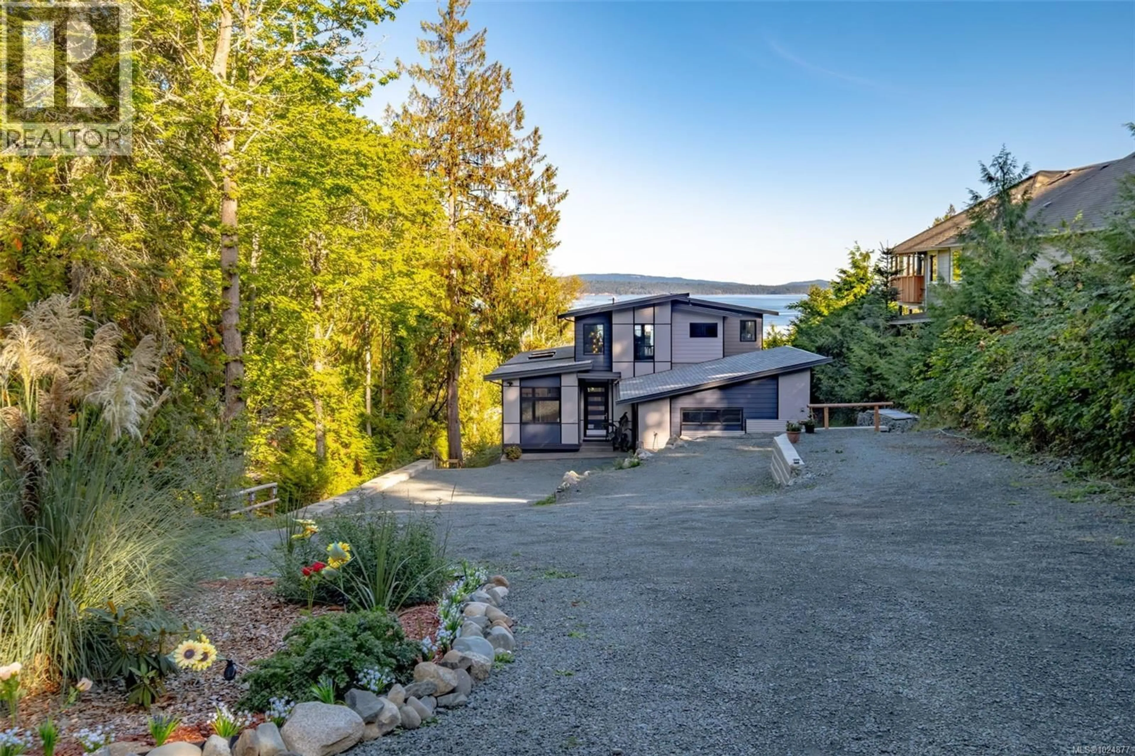 A pic from outside/outdoor area/front of a property/back of a property/a pic from drone, unknown for 10333 CHEMAINUS ROAD, Saltair British Columbia V0R1K2