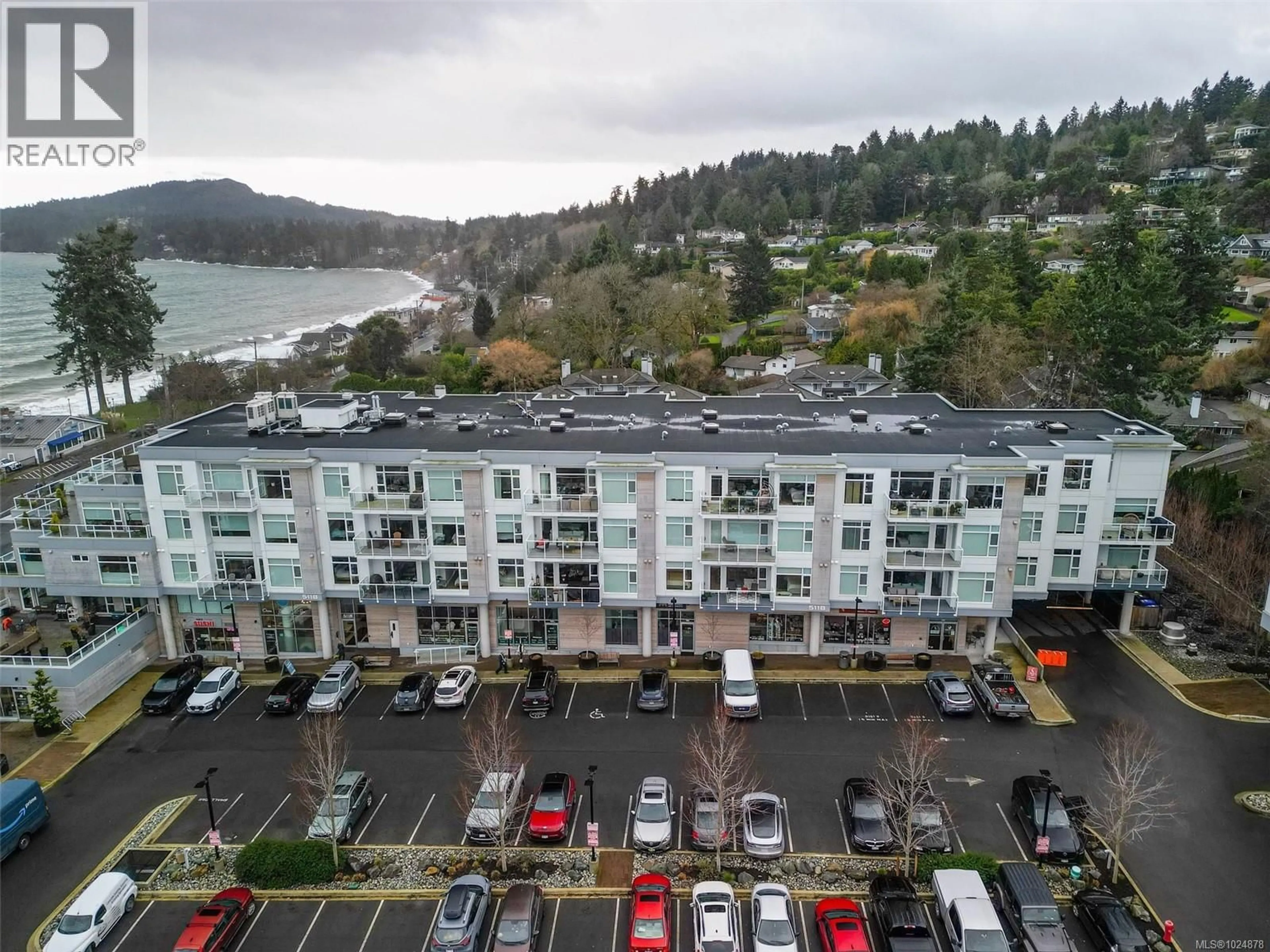 A pic from outside/outdoor area/front of a property/back of a property/a pic from drone, water/lake/river/ocean view for 203 - 5118 CORDOVA BAY ROAD, Saanich British Columbia V8X1R1