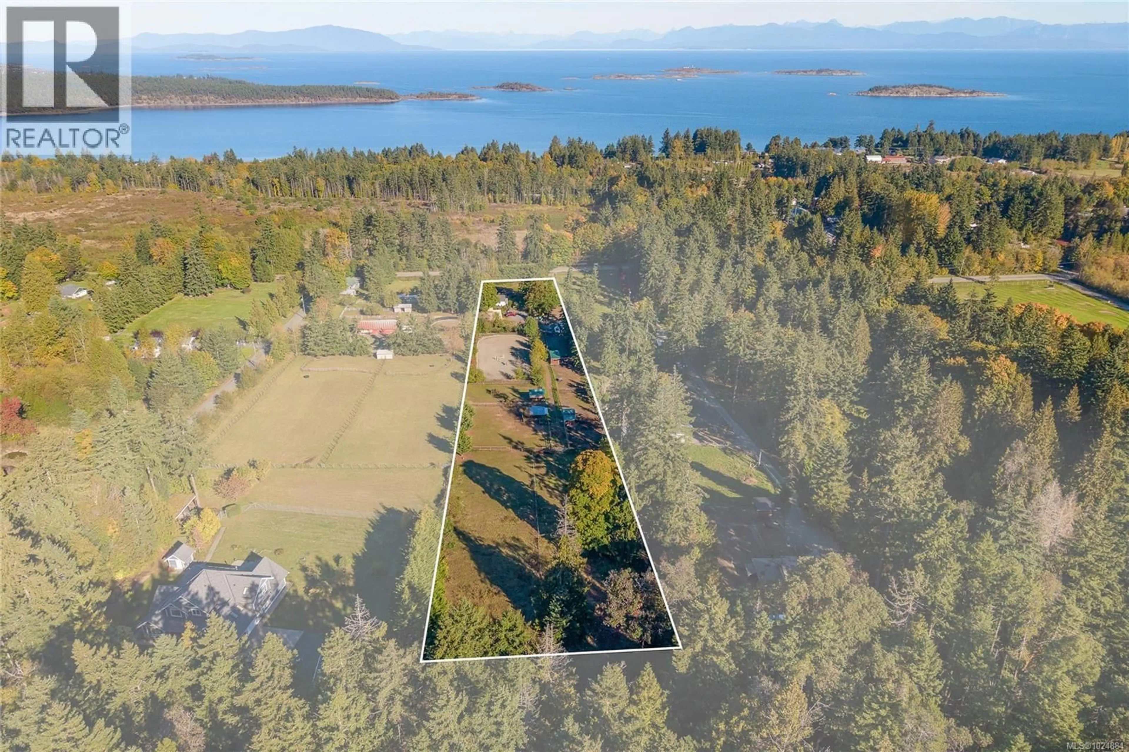 A pic from outside/outdoor area/front of a property/back of a property/a pic from drone, water/lake/river/ocean view for 7727 SUPERIOR ROAD, Lantzville British Columbia V0R2H0