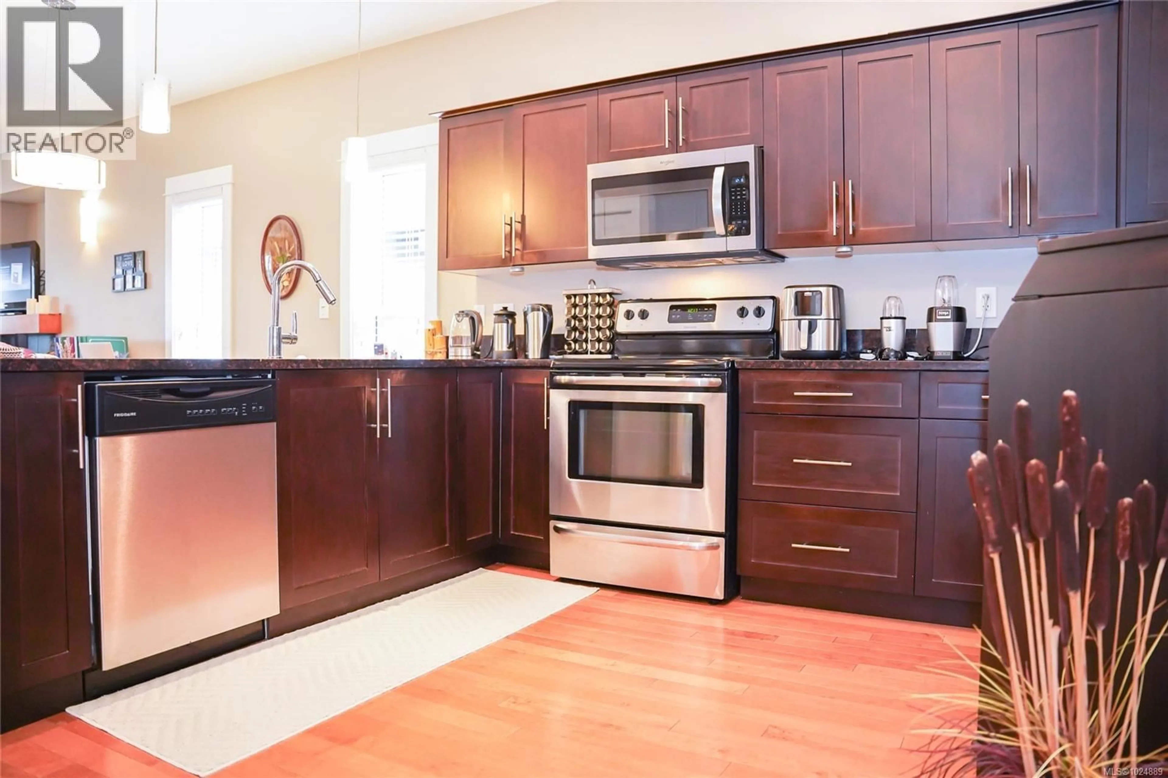 Open concept kitchen, wood/laminate floor for 7 - 2319 CHILCO ROAD, View Royal British Columbia V9B6S7