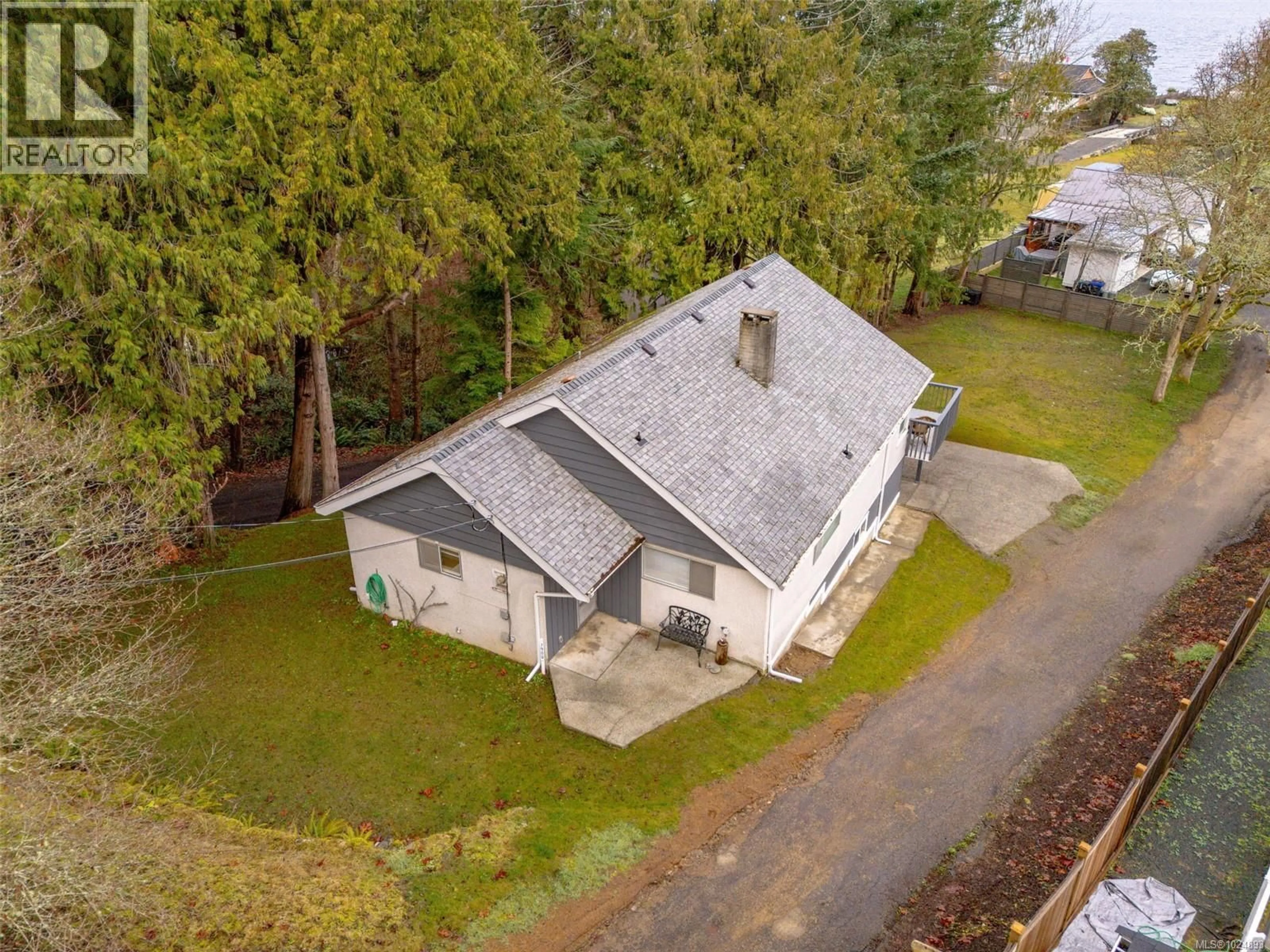 A pic from outside/outdoor area/front of a property/back of a property/a pic from drone, unknown for 7900 LANTZVILLE ROAD, Lantzville British Columbia V0R2H0