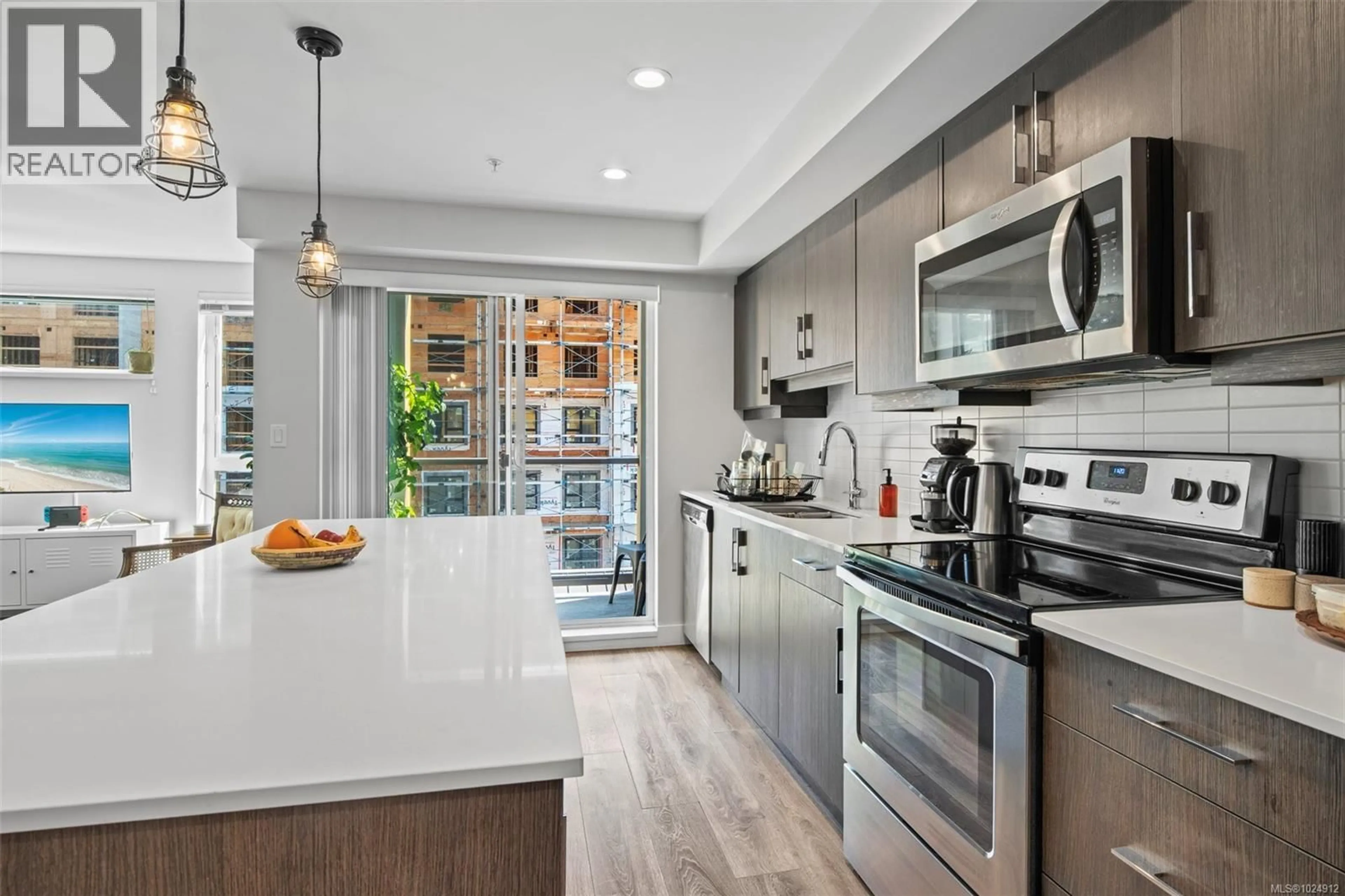 Open concept kitchen, ceramic/tile floor for 403 - 826 ESQUIMALT ROAD, Esquimalt British Columbia V9A3M4