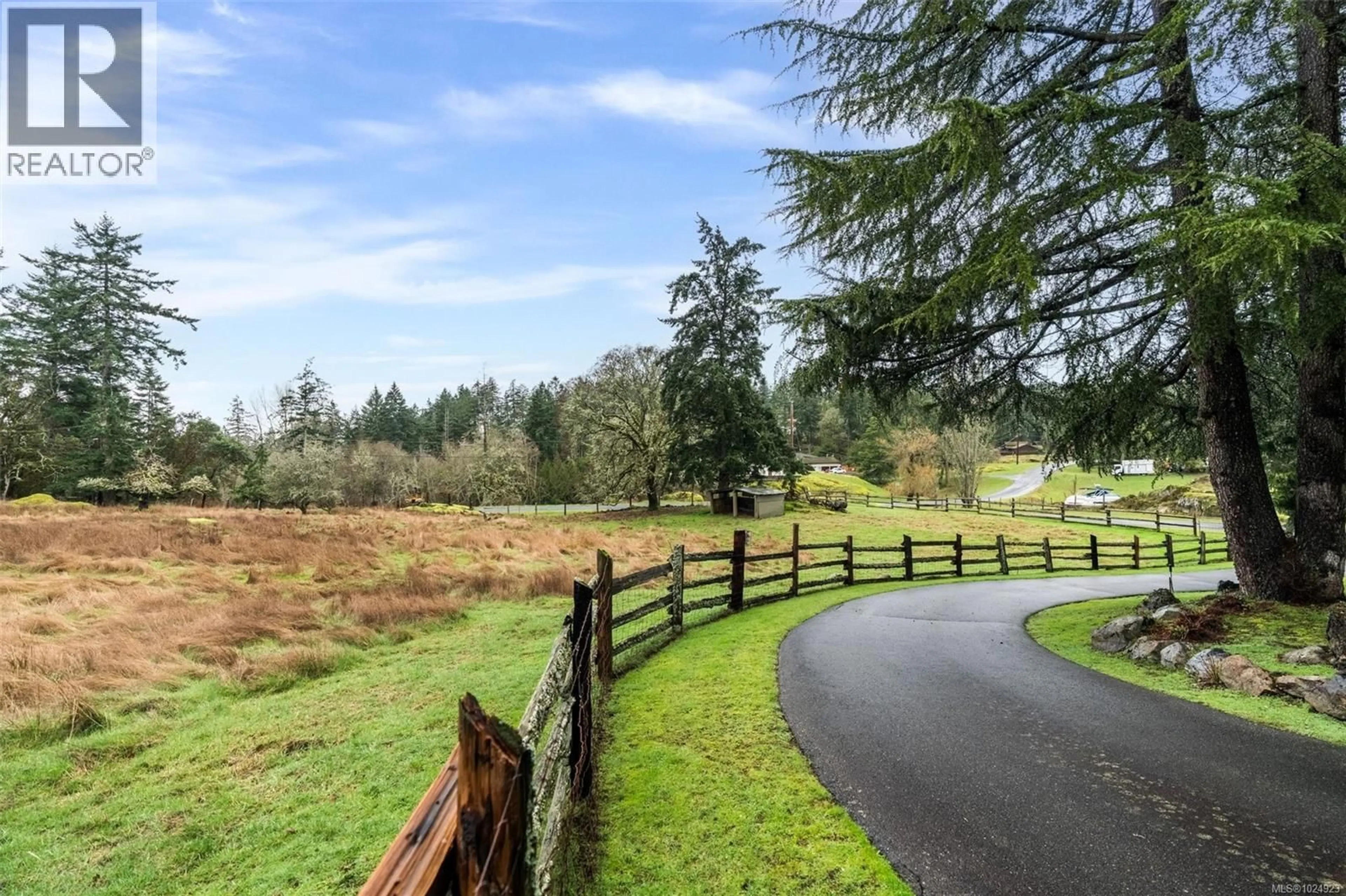 A pic from outside/outdoor area/front of a property/back of a property/a pic from drone, forest/trees view for 4395 LIBERTO ROAD, Saanich British Columbia V9E2C4