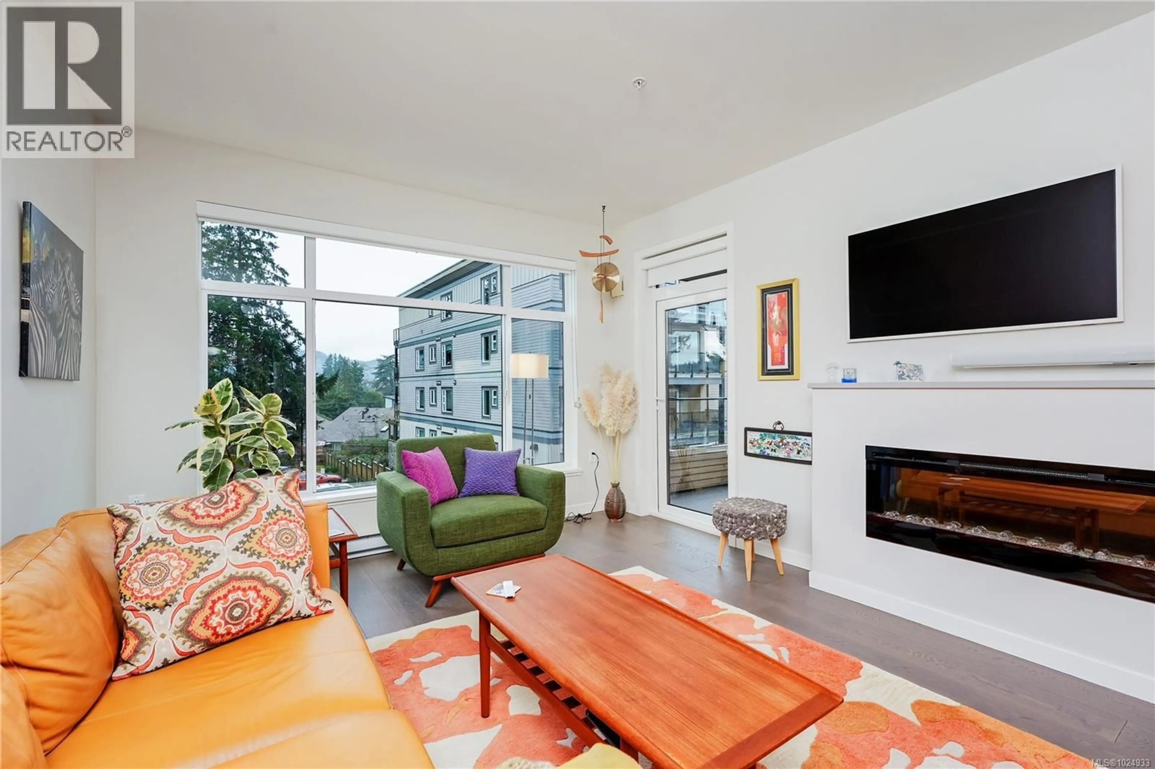 Living room with furniture, unknown for 308 - 7162 WEST SAANICH ROAD, Central Saanich British Columbia V8M1P6