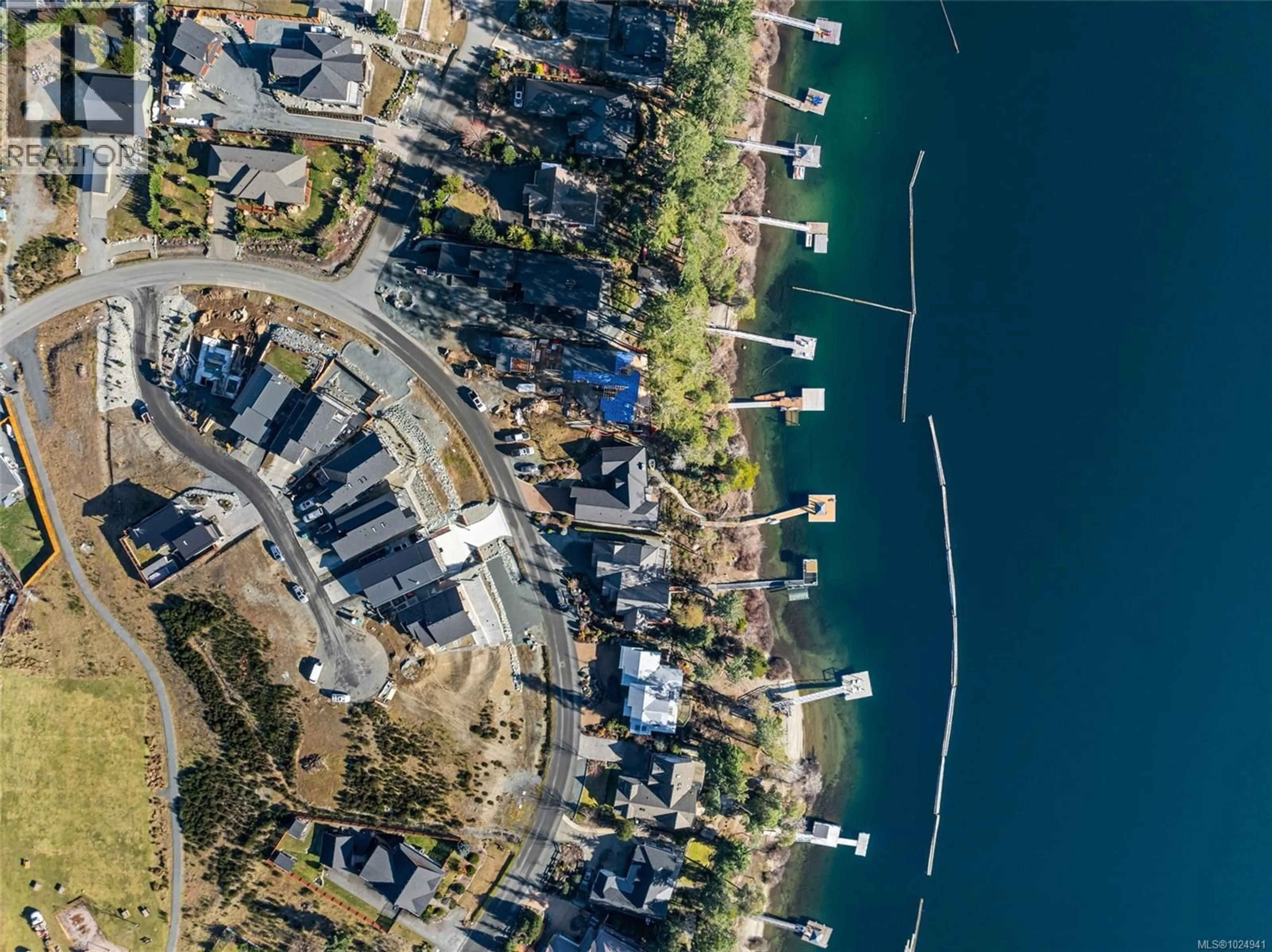 A pic from outside/outdoor area/front of a property/back of a property/a pic from drone, water/lake/river/ocean view for 9394 LAKEFRONT RISE, Lake Cowichan British Columbia V0R2G0