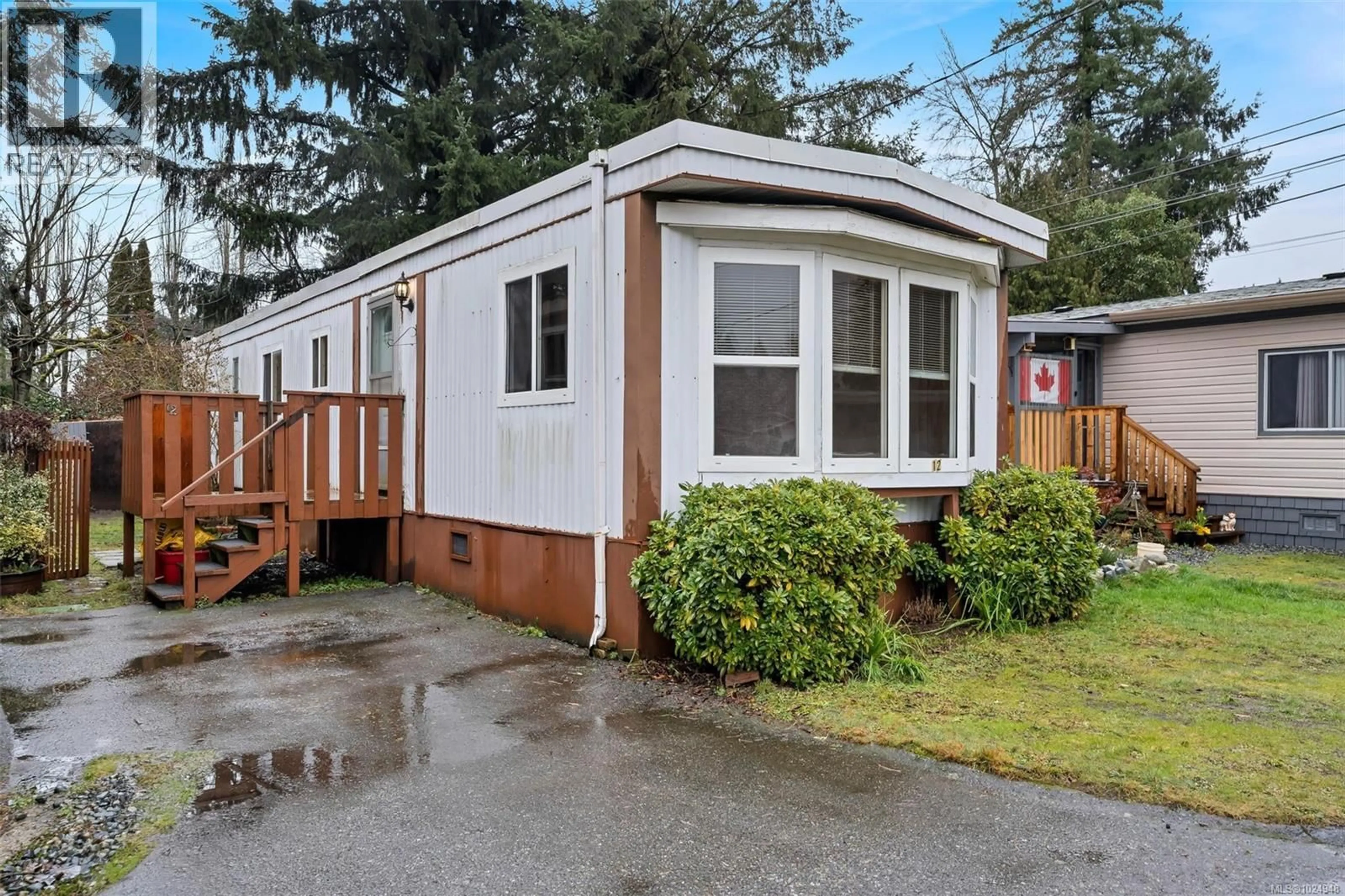 Home with vinyl exterior material, street for 12 - 10860 CHEMAINUS ROAD, Saltair British Columbia V9G2A4