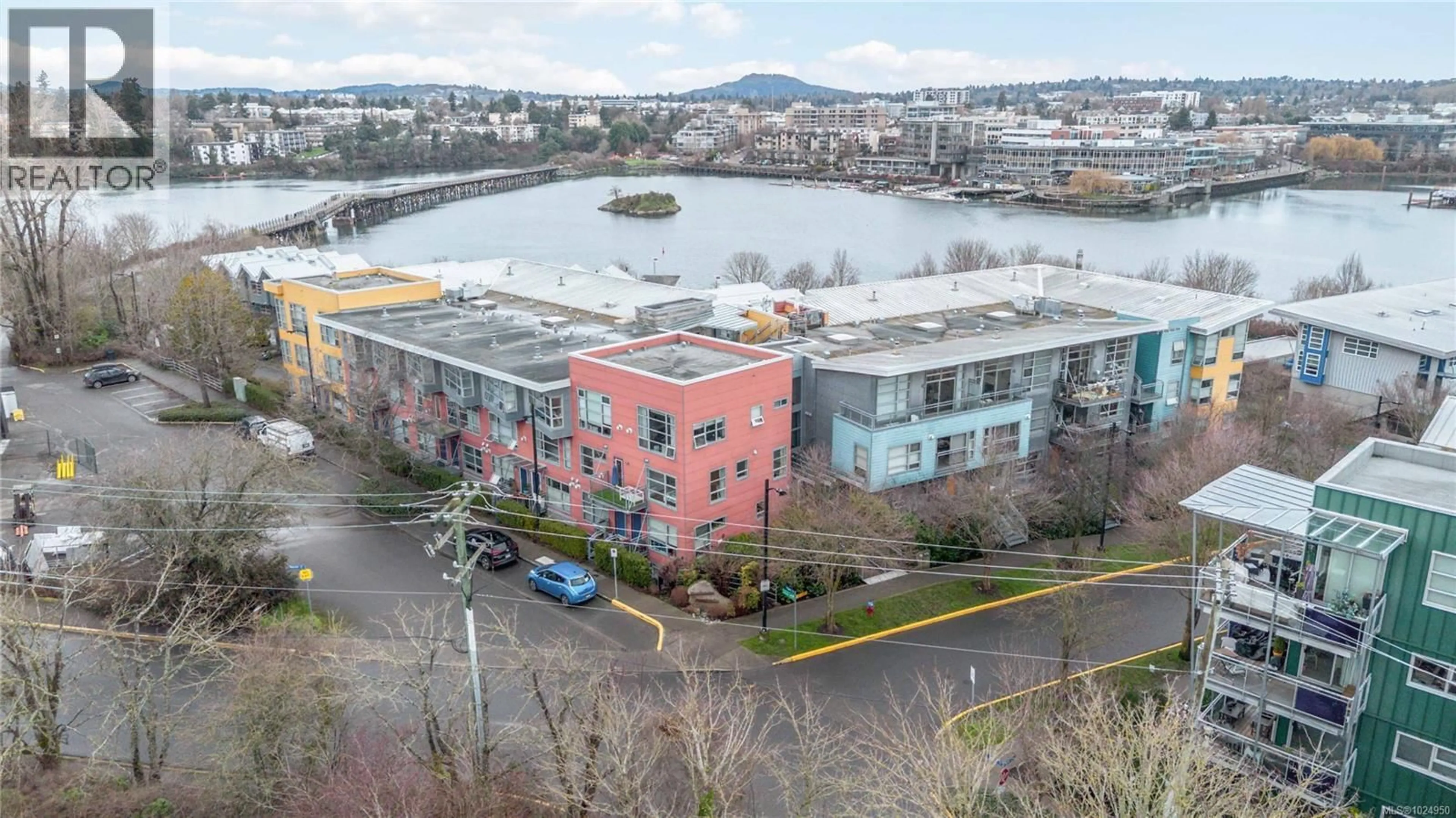 A pic from outside/outdoor area/front of a property/back of a property/a pic from drone, water/lake/river/ocean view for 313 - 90 REGATTA LANDING, Victoria British Columbia V9A7R2