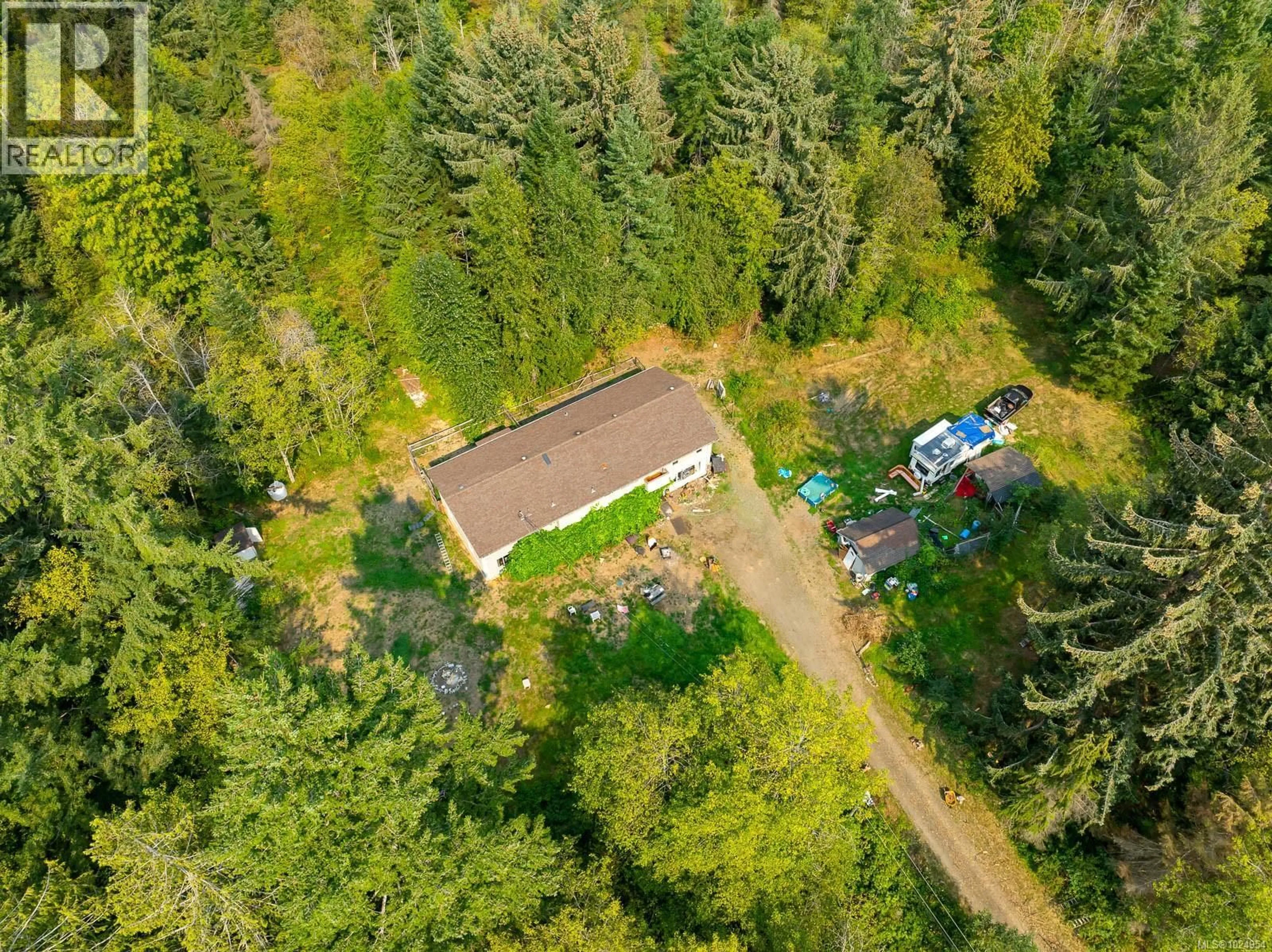 A pic from outside/outdoor area/front of a property/back of a property/a pic from drone, forest/trees view for 2180 SCHULZ ROAD, Black Creek British Columbia V9J1K5