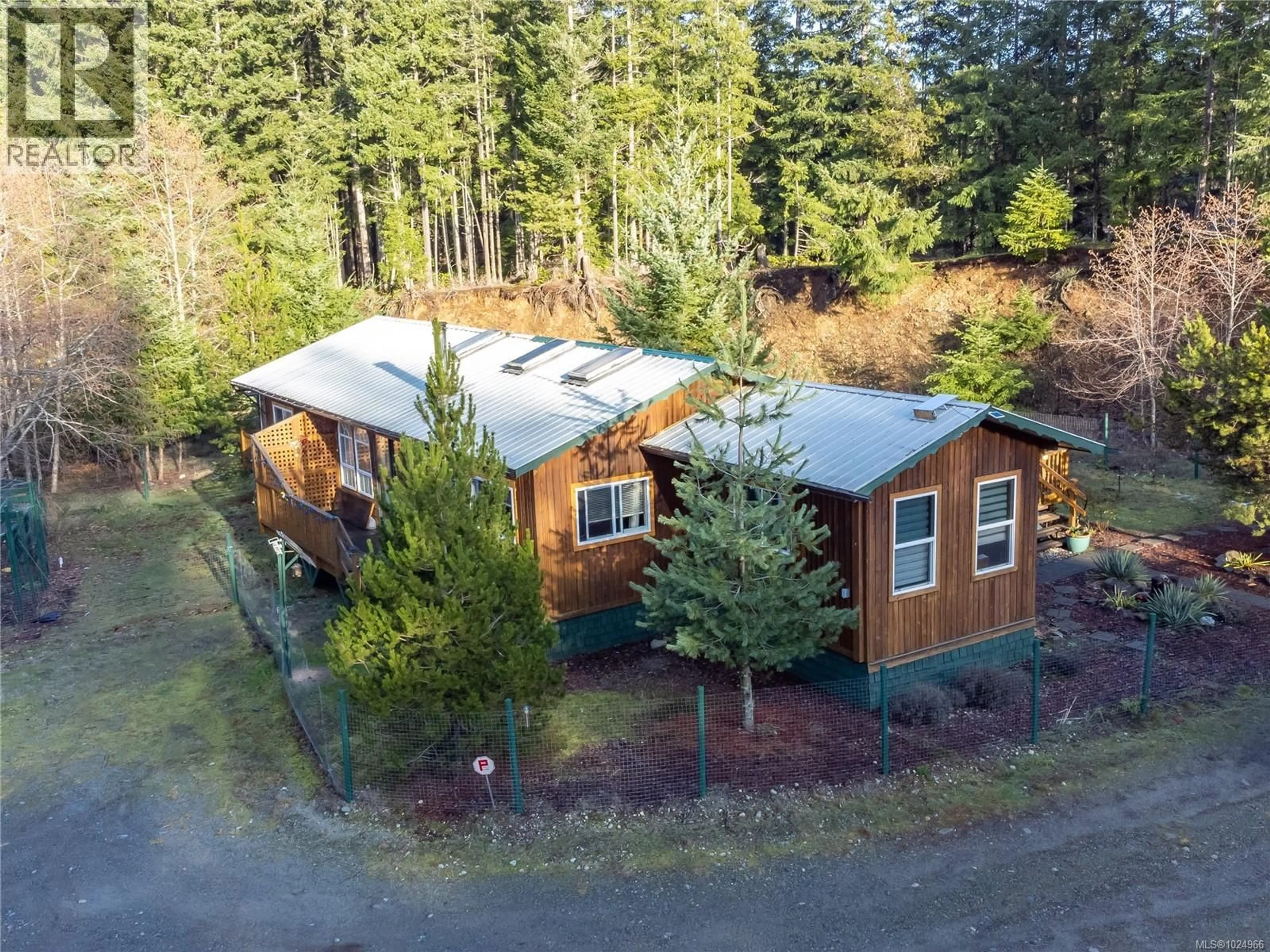 A pic from outside/outdoor area/front of a property/back of a property/a pic from drone, forest/trees view for 360 CAPE MUDGE ROAD, Quadra Island British Columbia V0P1H0