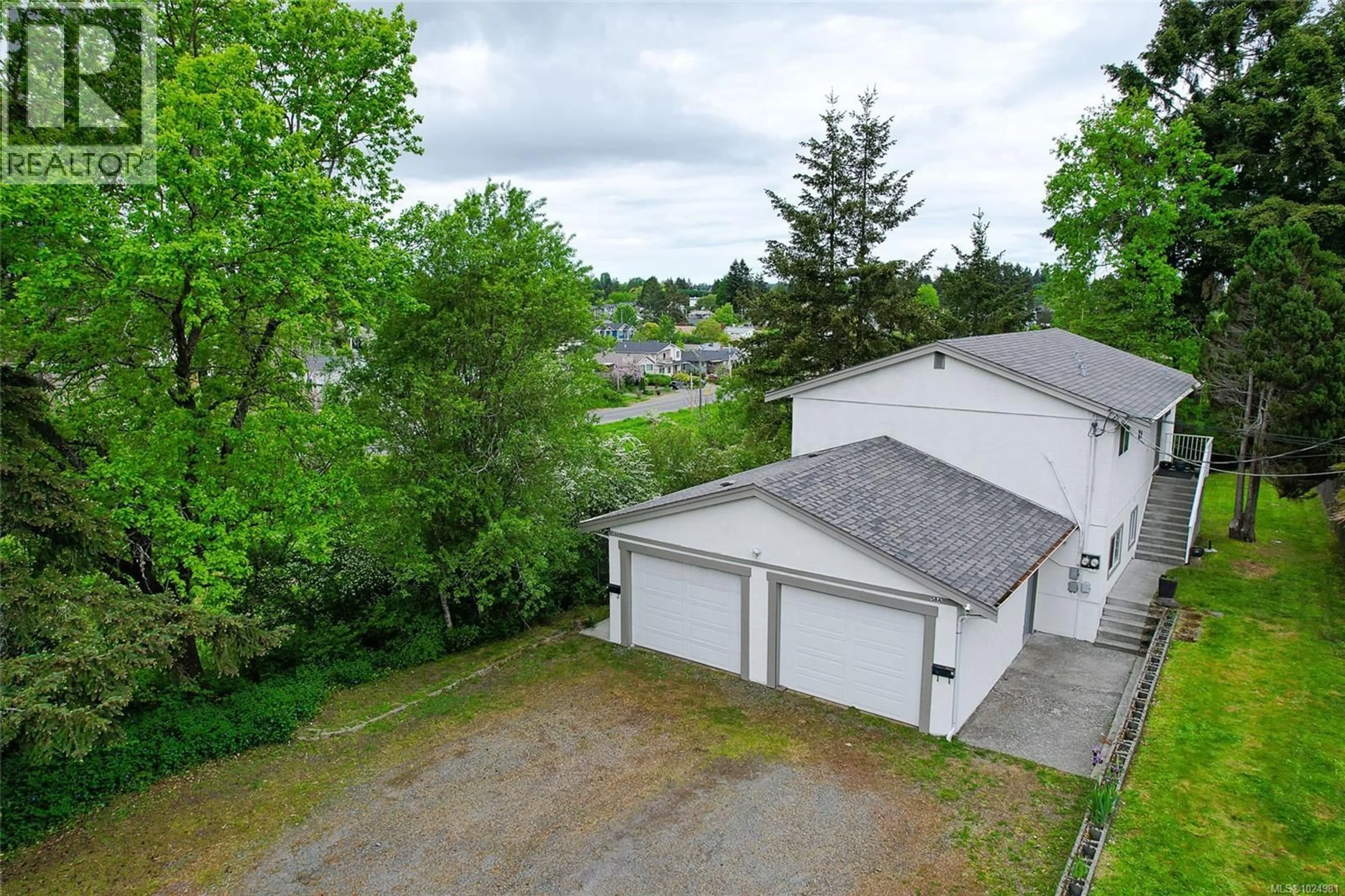A pic from outside/outdoor area/front of a property/back of a property/a pic from drone, water/lake/river/ocean view for 58 DUKE STREET, Nanaimo British Columbia V9R5M8