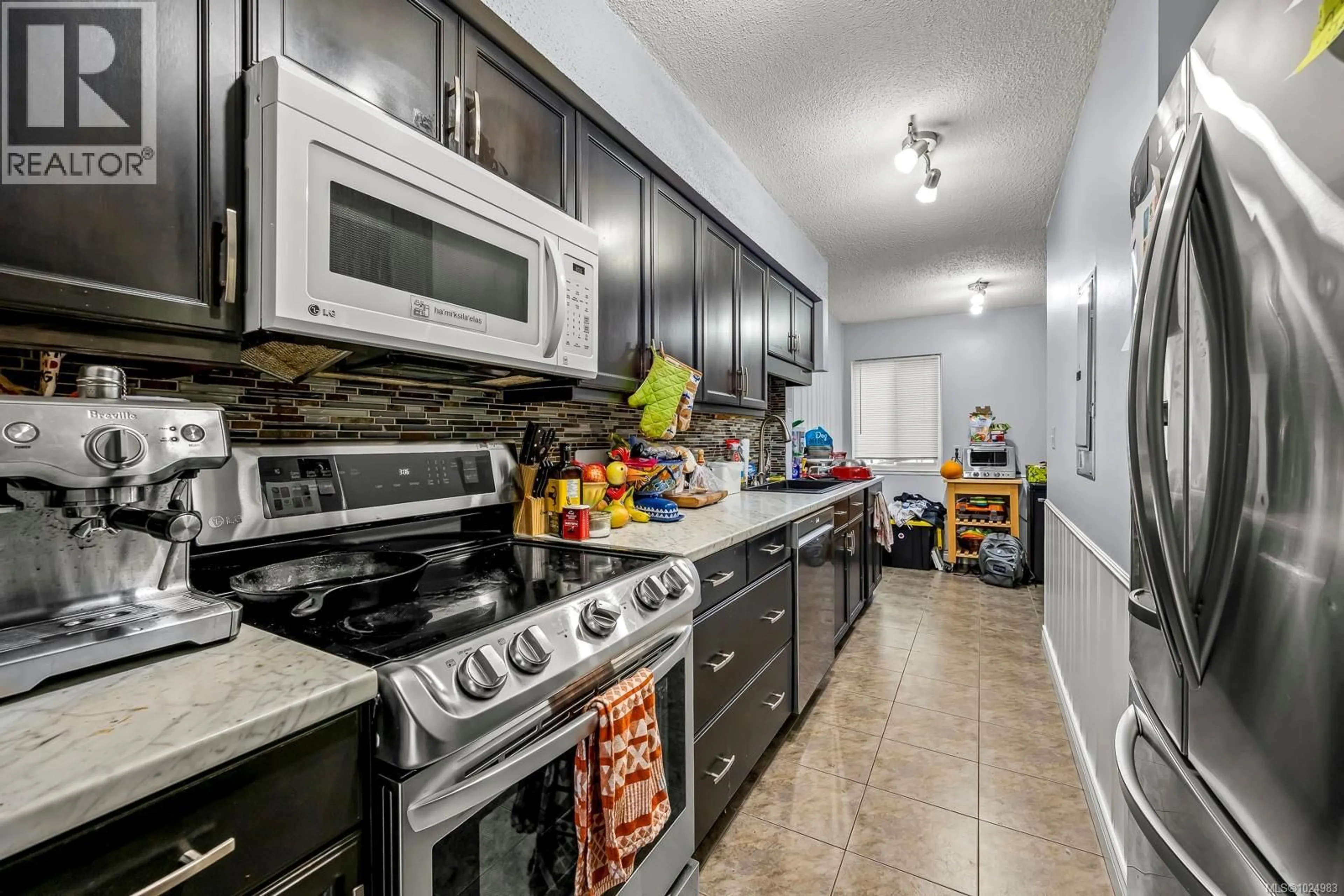 Standard kitchen, ceramic/tile floor for 44 - 1957 GUTHRIE ROAD, Comox British Columbia V9M2J2