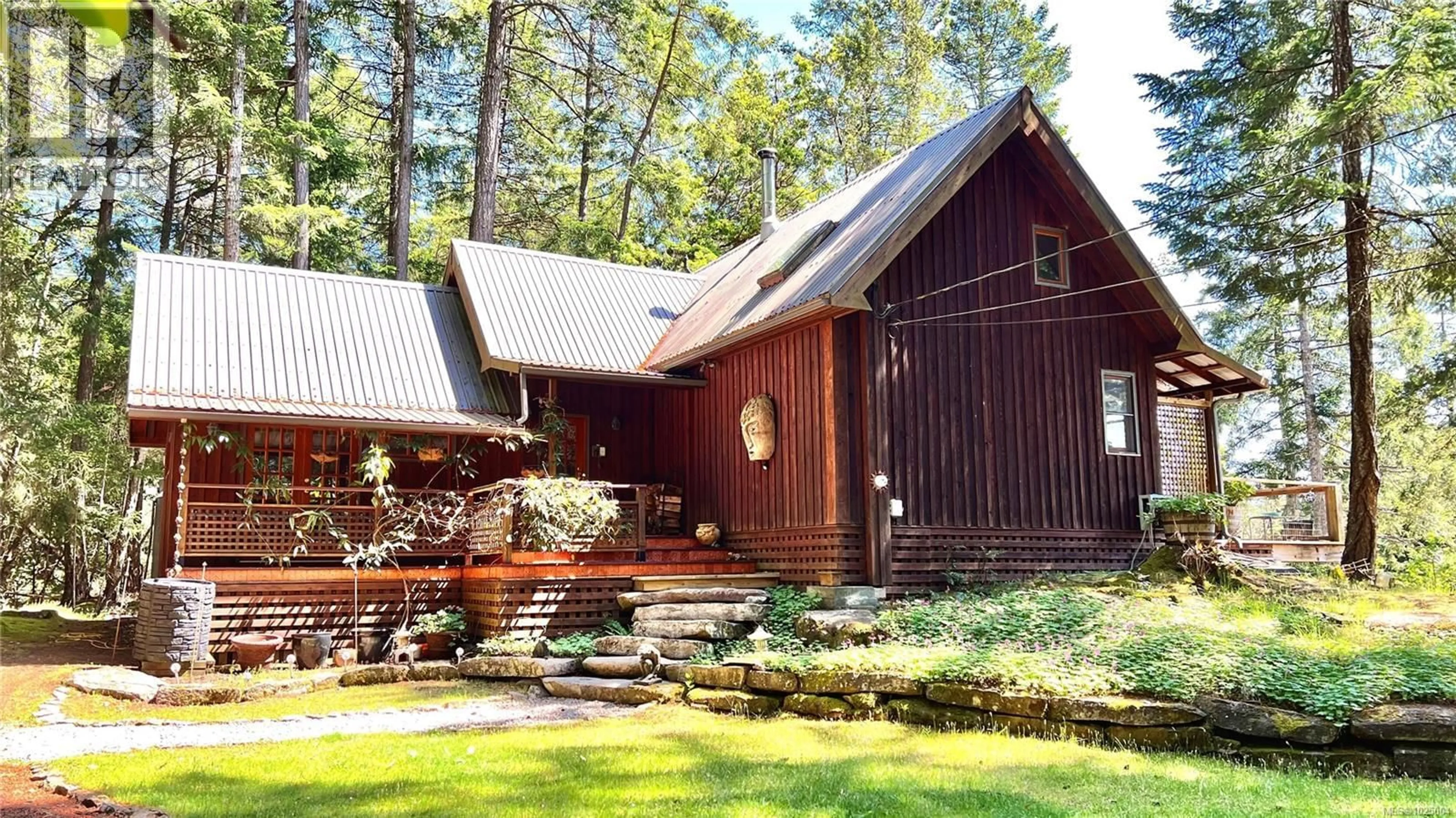 Home with brick exterior material, unknown for 231 HALIBUT HILL ROAD, Mudge Island British Columbia V0R1X6