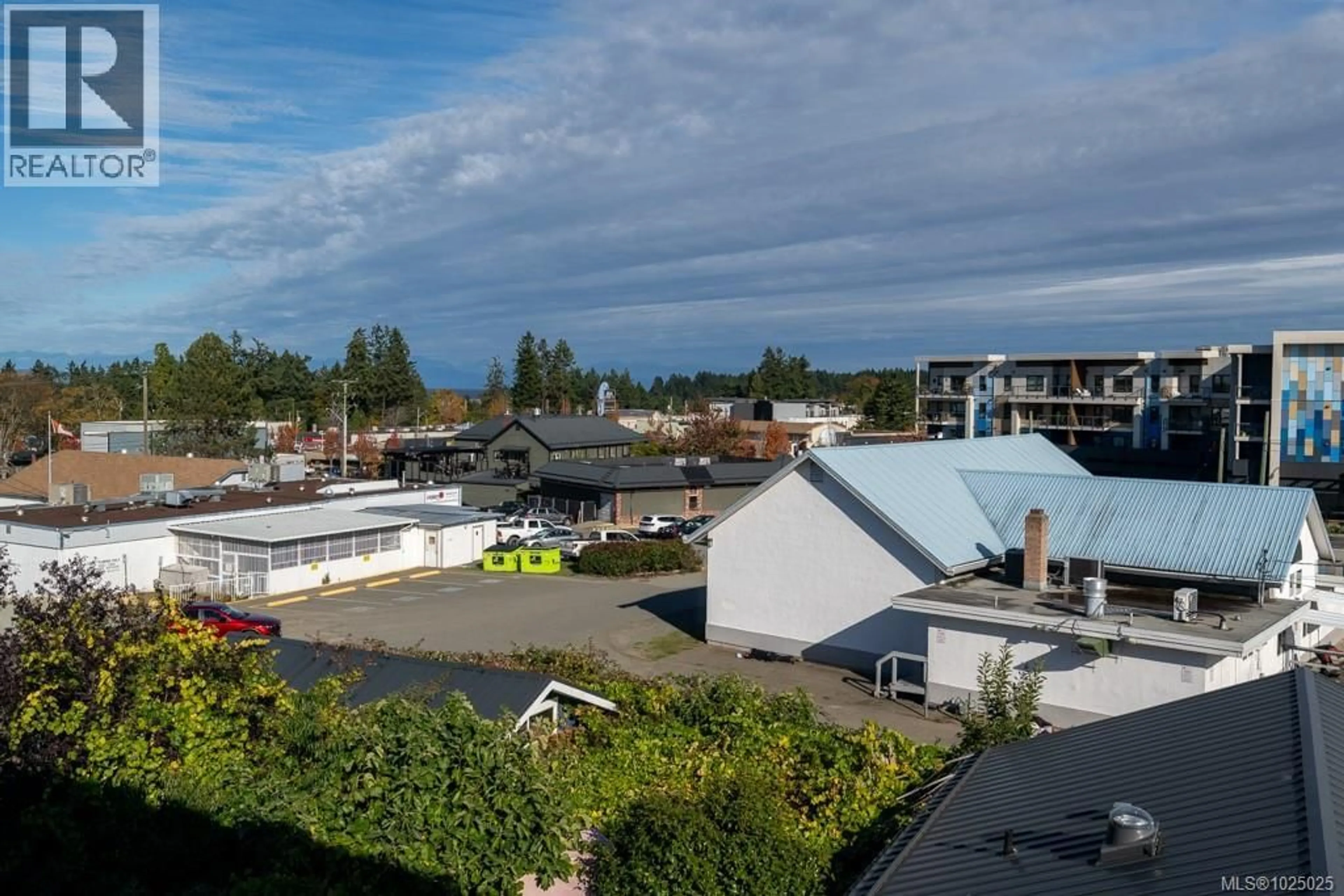 A pic from outside/outdoor area/front of a property/back of a property/a pic from drone, city buildings view from balcony for 312 - 171 JENSEN AVENUE WEST, Parksville British Columbia V9P1K3
