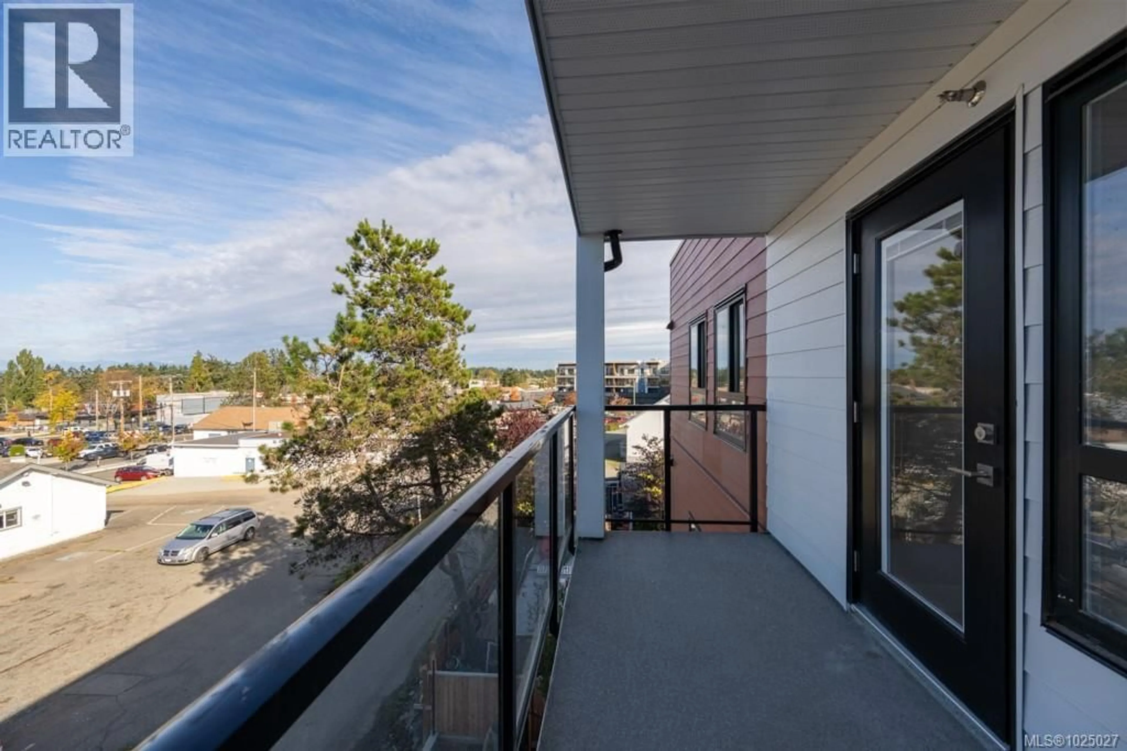 Balcony in the apartment, city buildings view from balcony for 315 - 171 JENSEN AVENUE WEST, Parksville British Columbia V9P1K3