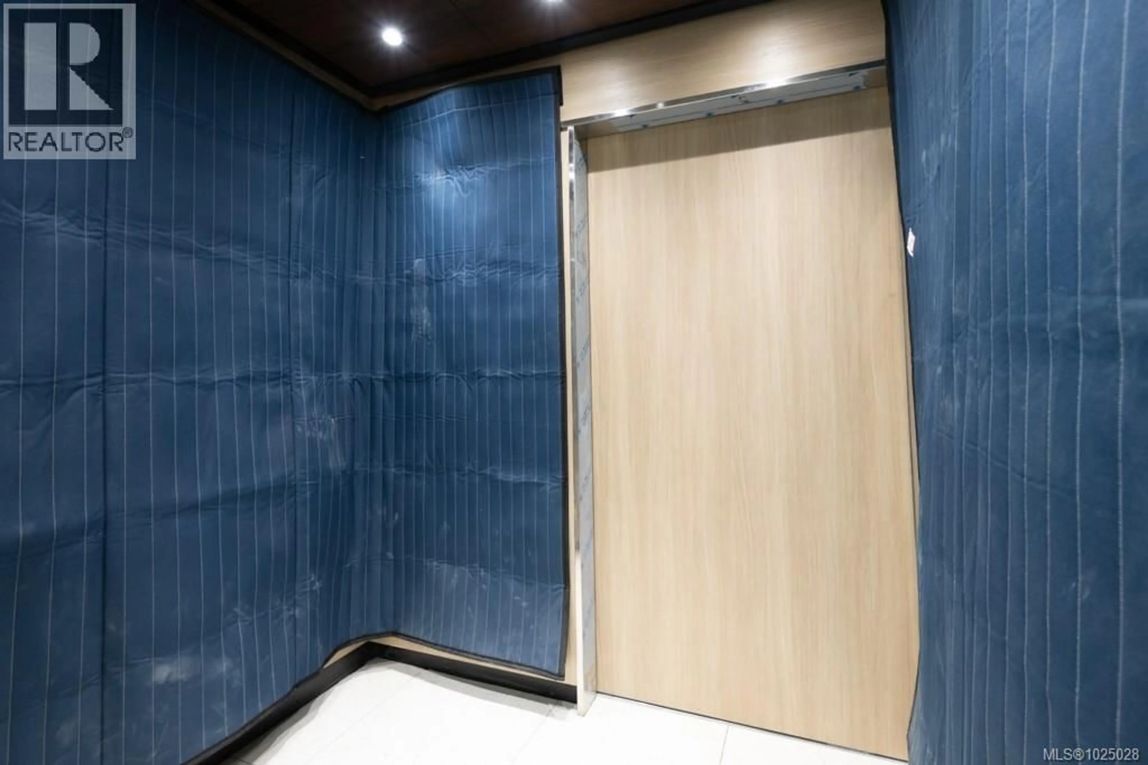 Indoor foyer for 204 - 171 JENSEN AVENUE WEST, Parksville British Columbia V9P1K3