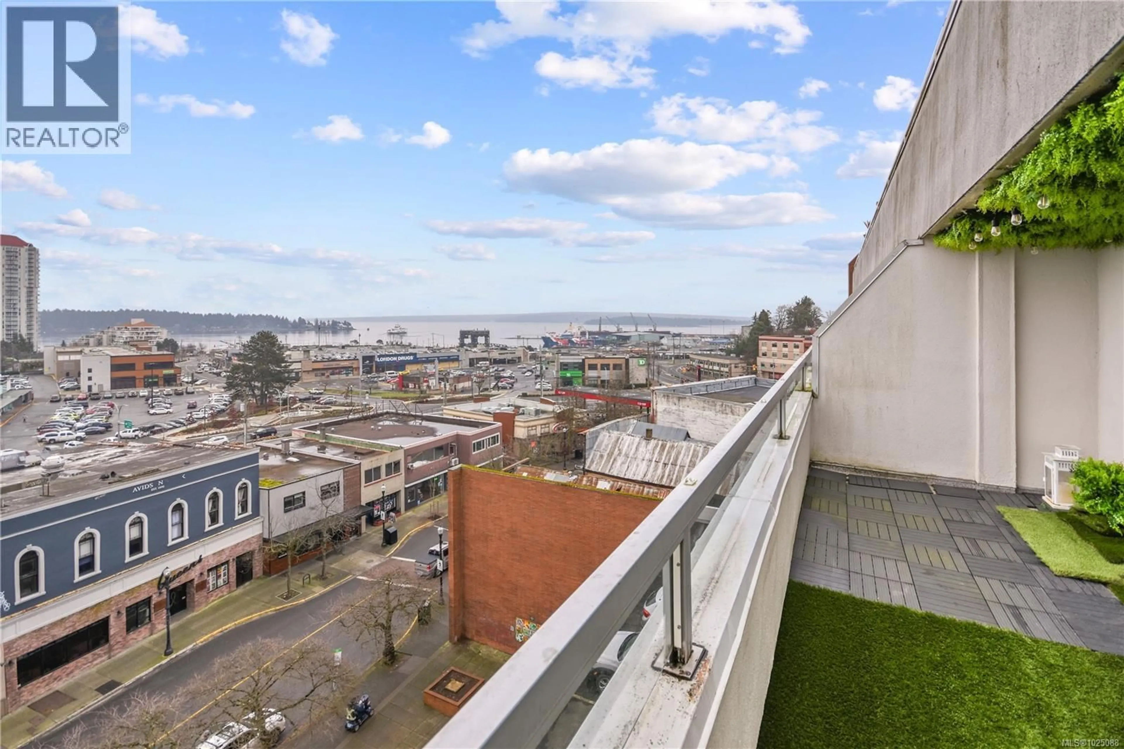 Balcony in the apartment, city buildings view from balcony for 309 - 30 CAVAN STREET, Nanaimo British Columbia V9R6K3
