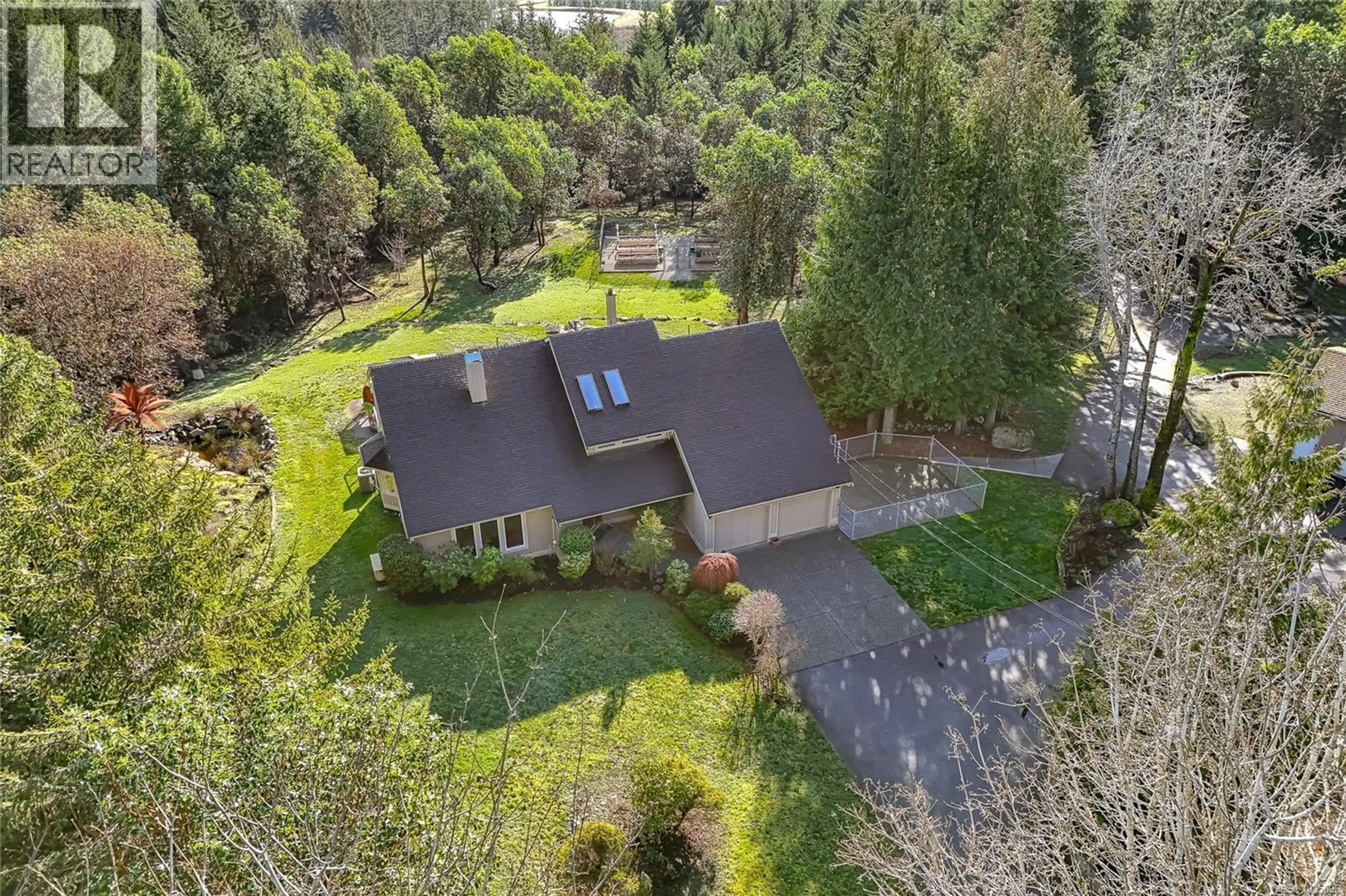 A pic from outside/outdoor area/front of a property/back of a property/a pic from drone, forest/trees view for 8273 THOMSON PLACE, Central Saanich British Columbia V8M1T6