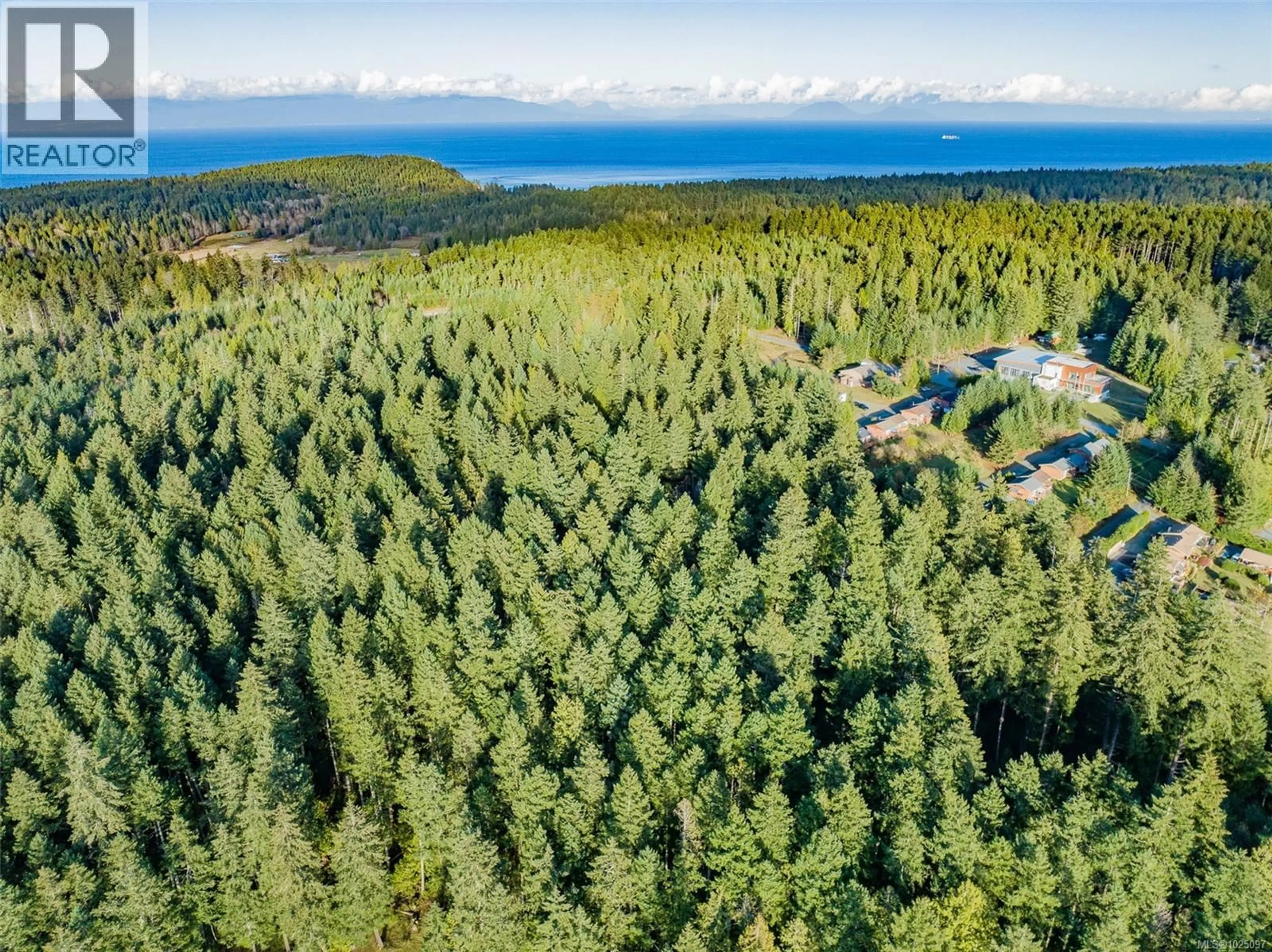 A pic from outside/outdoor area/front of a property/back of a property/a pic from drone, forest/trees view for 15 - 745 CHURCH STREET, Gabriola Island British Columbia V0R1X3