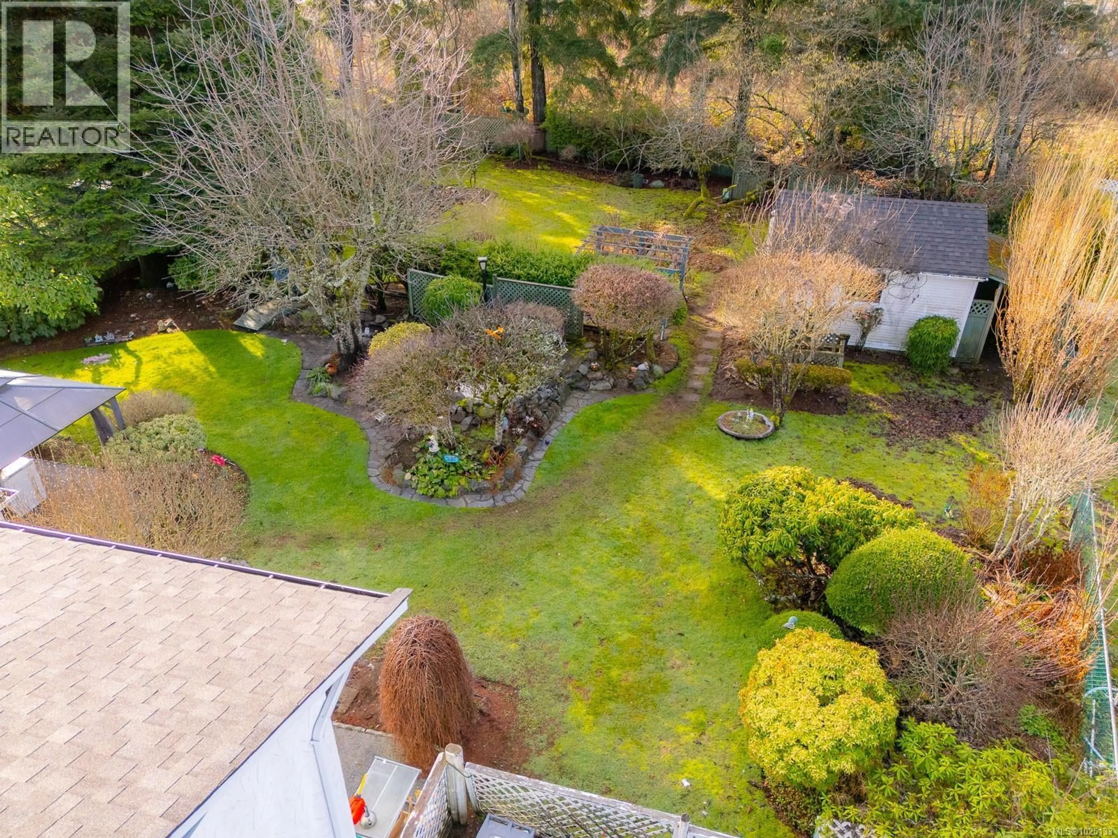 A pic from outside/outdoor area/front of a property/back of a property/a pic from drone, forest/trees view for 5173 SOMERSET DRIVE, Nanaimo British Columbia V9T2K5
