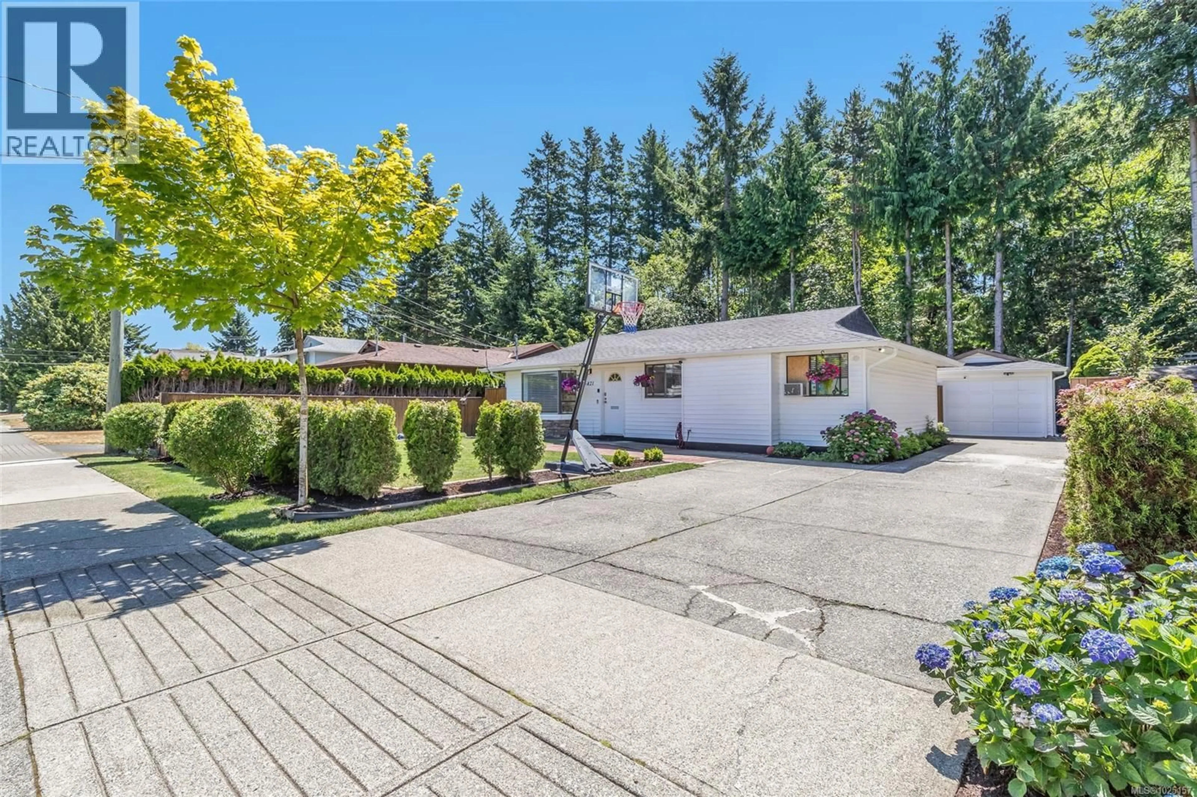 A pic from outside/outdoor area/front of a property/back of a property/a pic from drone, street for 6421 PORTSMOUTH ROAD, Nanaimo British Columbia V9V1A3