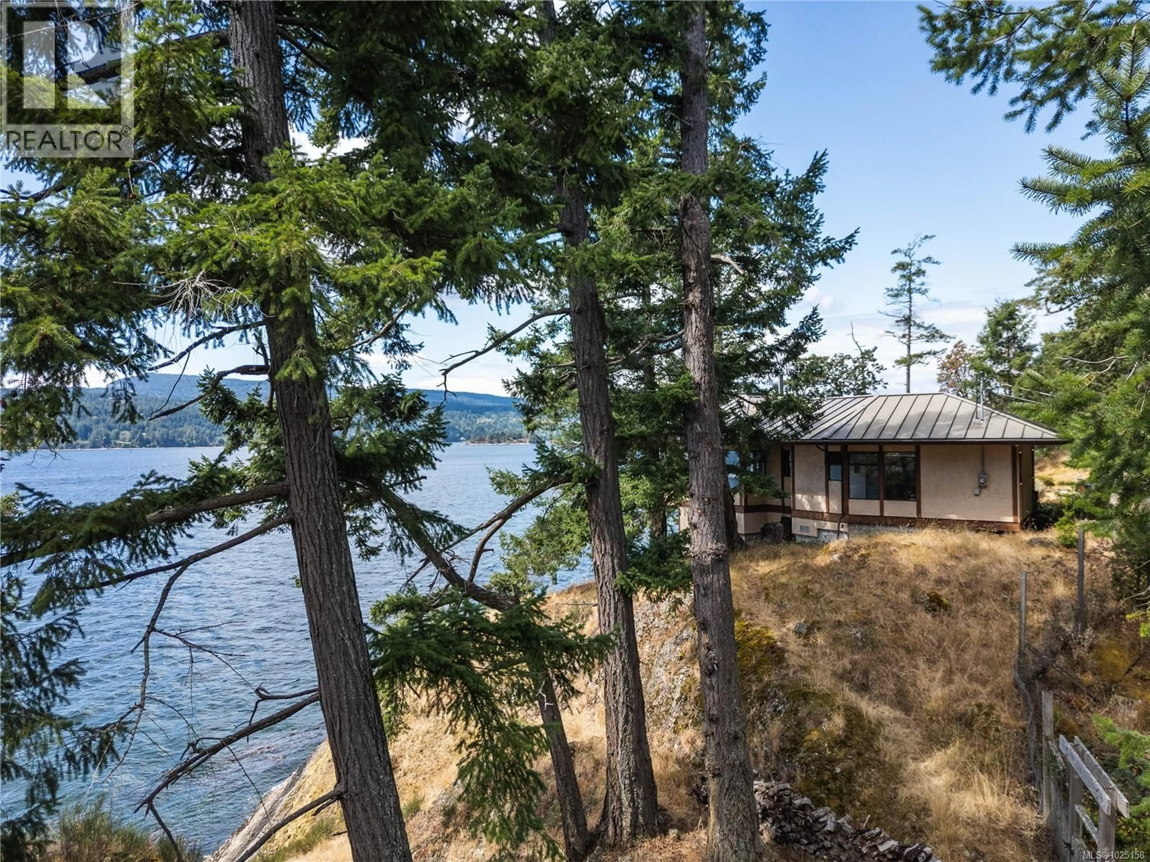 A pic from outside/outdoor area/front of a property/back of a property/a pic from drone, water/lake/river/ocean view for 456 SCOTT POINT DRIVE, Salt Spring British Columbia V8K2R2