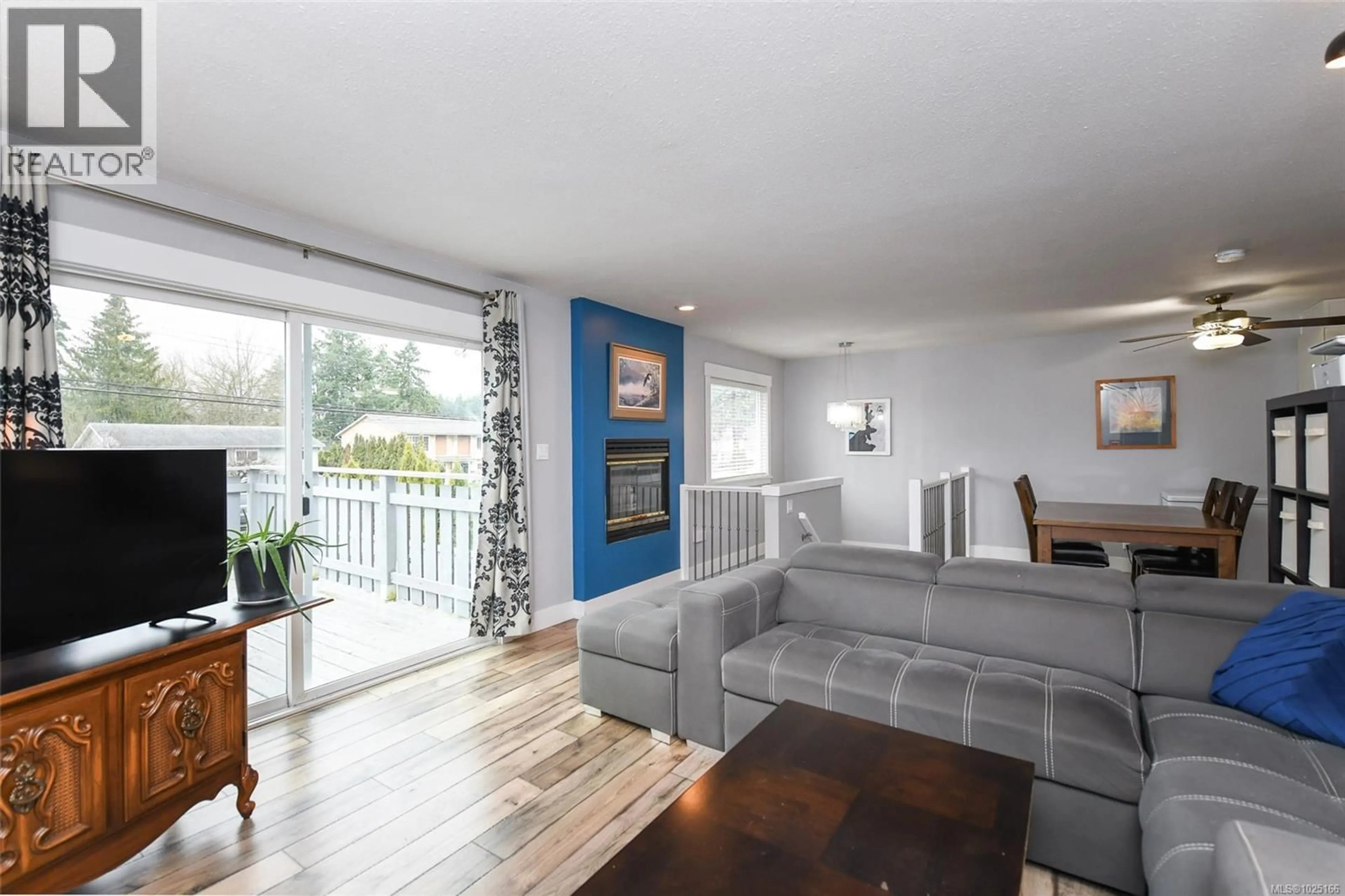 Living room with furniture, wood/laminate floor for 2350B WILLEMAR AVENUE, Courtenay British Columbia V9N3M8