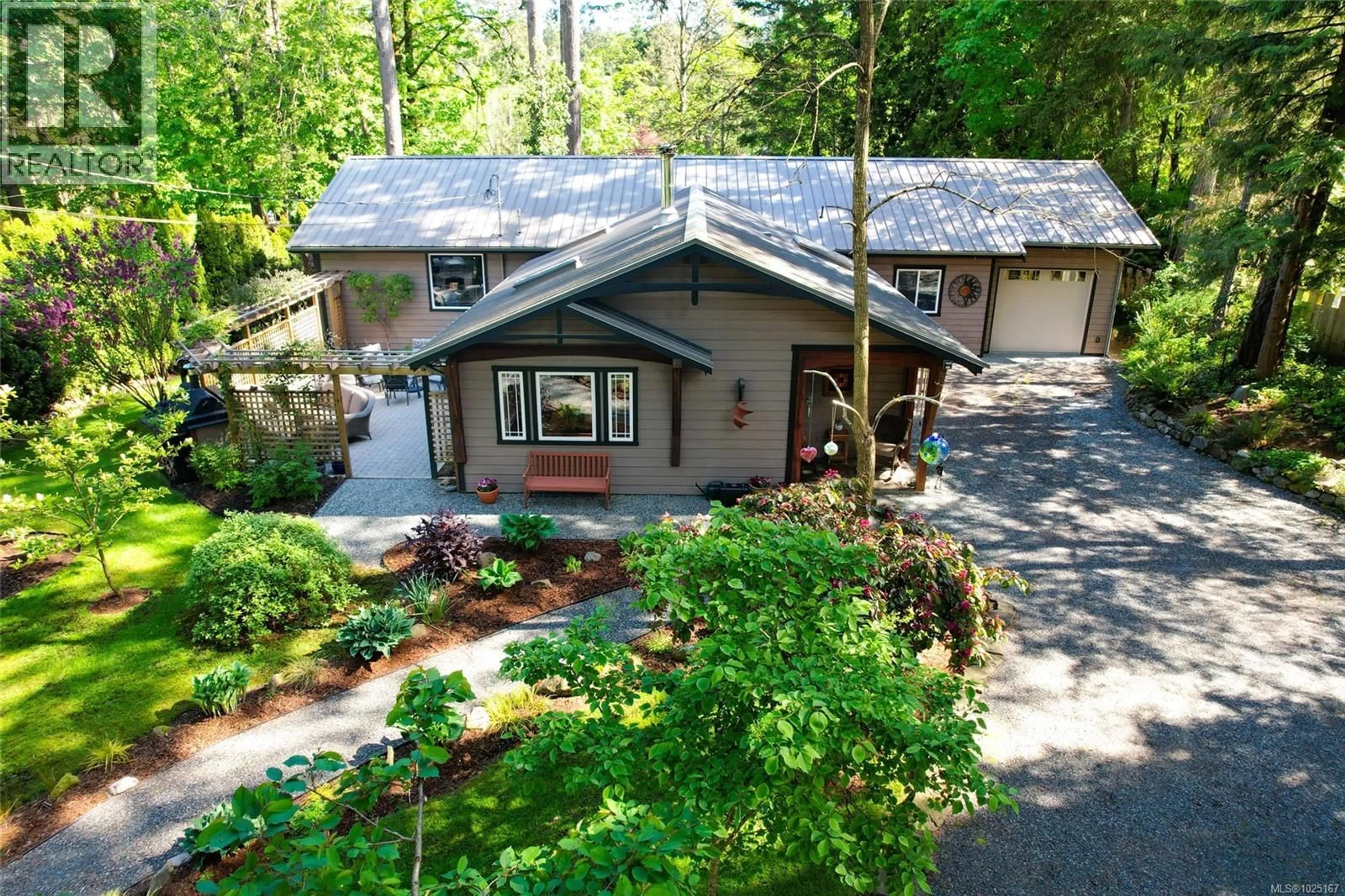 A pic from outside/outdoor area/front of a property/back of a property/a pic from drone, forest/trees view for 1126 NORTH ROAD, Gabriola Island British Columbia V0R1X3