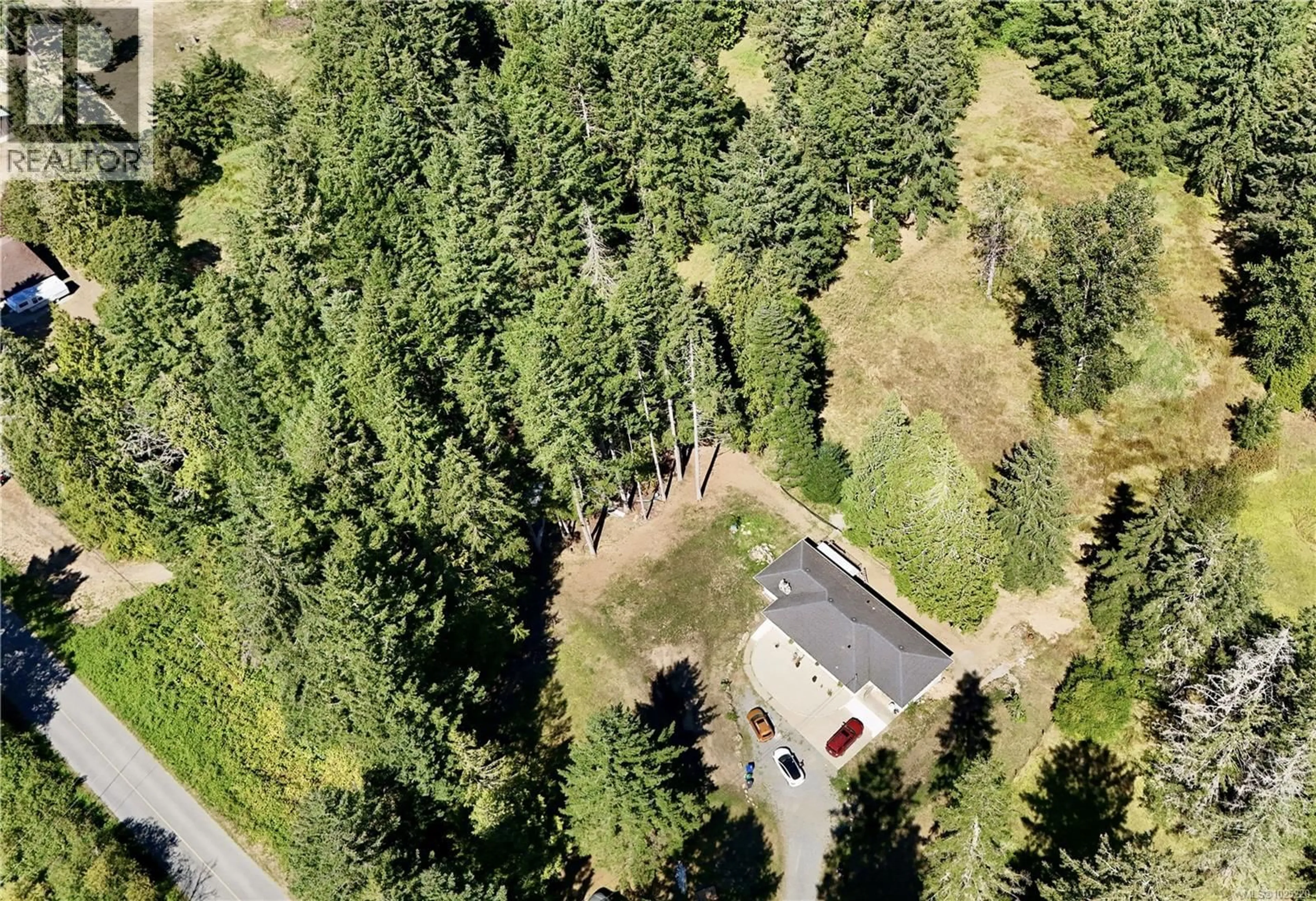 A pic from outside/outdoor area/front of a property/back of a property/a pic from drone, forest/trees view for 3090 DECOURCY DRIVE, Nanaimo British Columbia V9G1E2