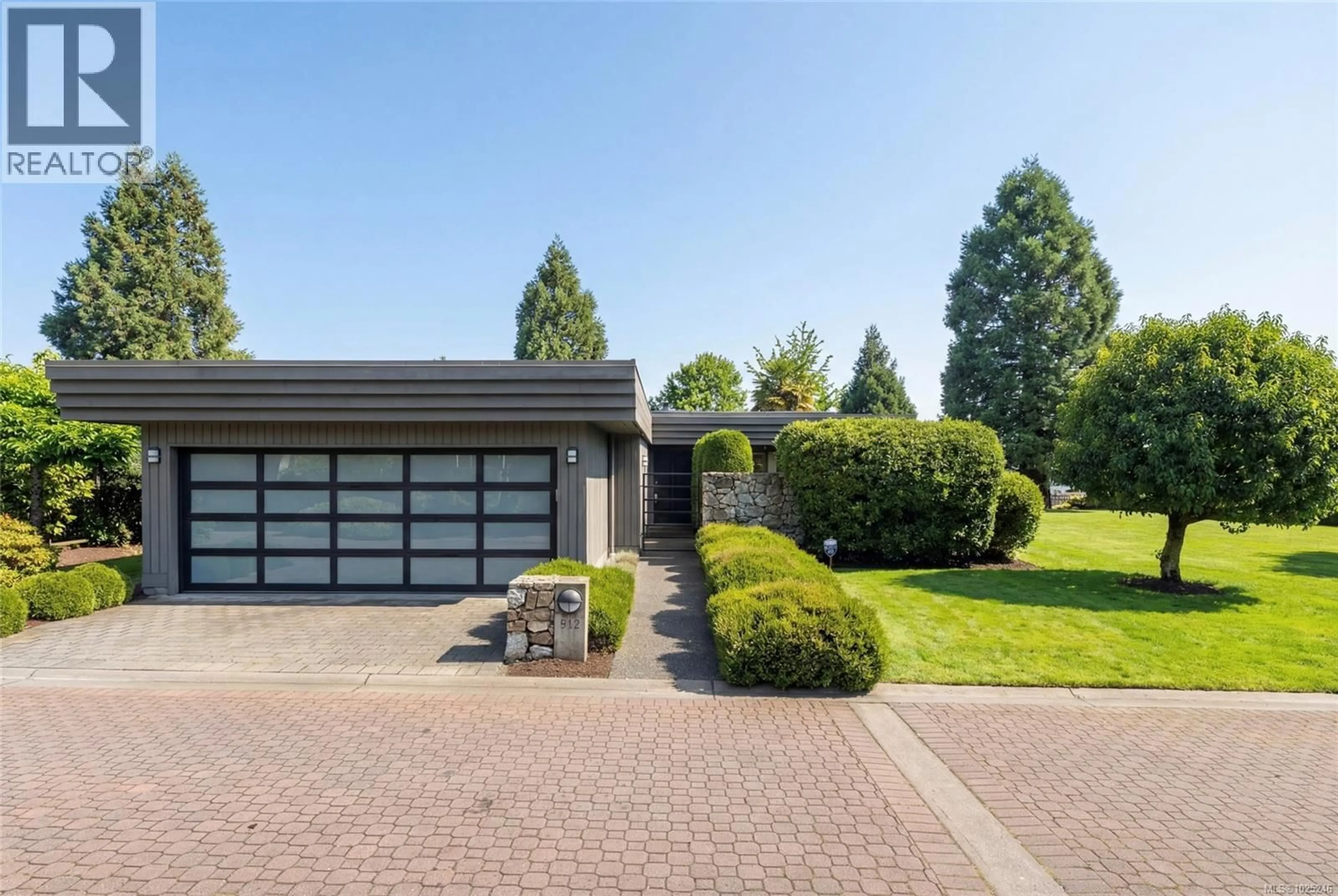 Home with brick exterior material, street for 912 WALKING STICK LANE, Saanich British Columbia V8Y3H6