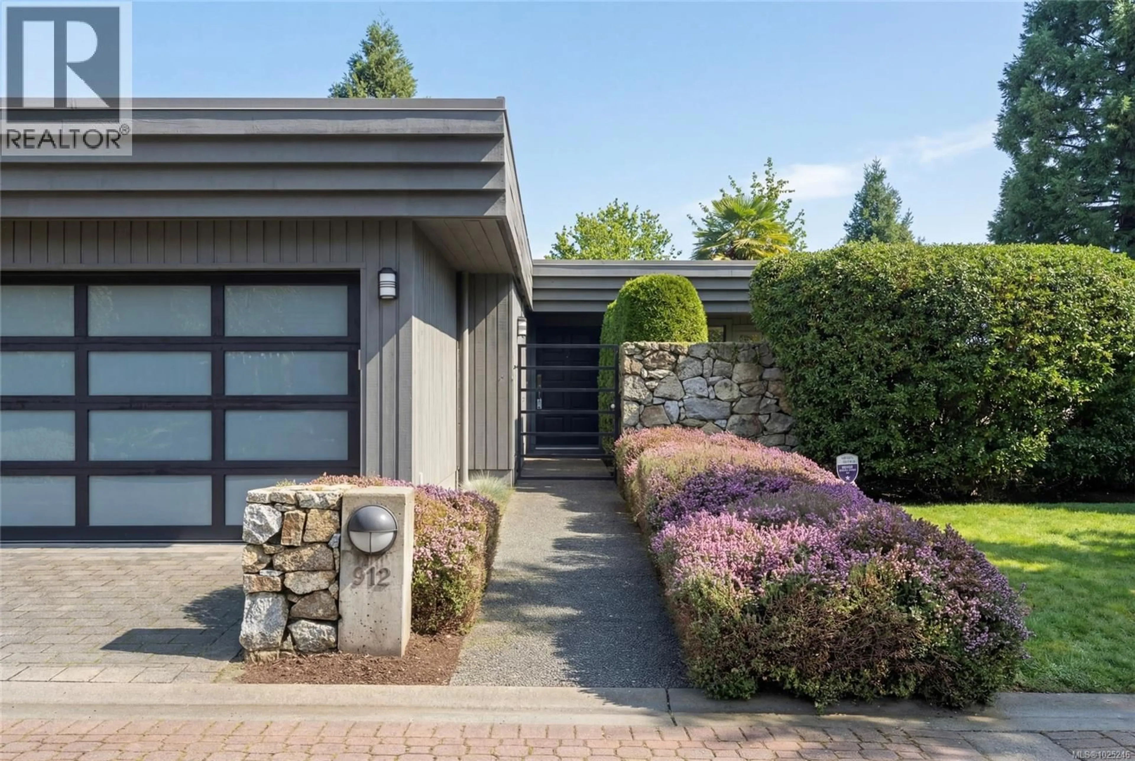 Home with brick exterior material, street for 912 WALKING STICK LANE, Saanich British Columbia V8Y3H6