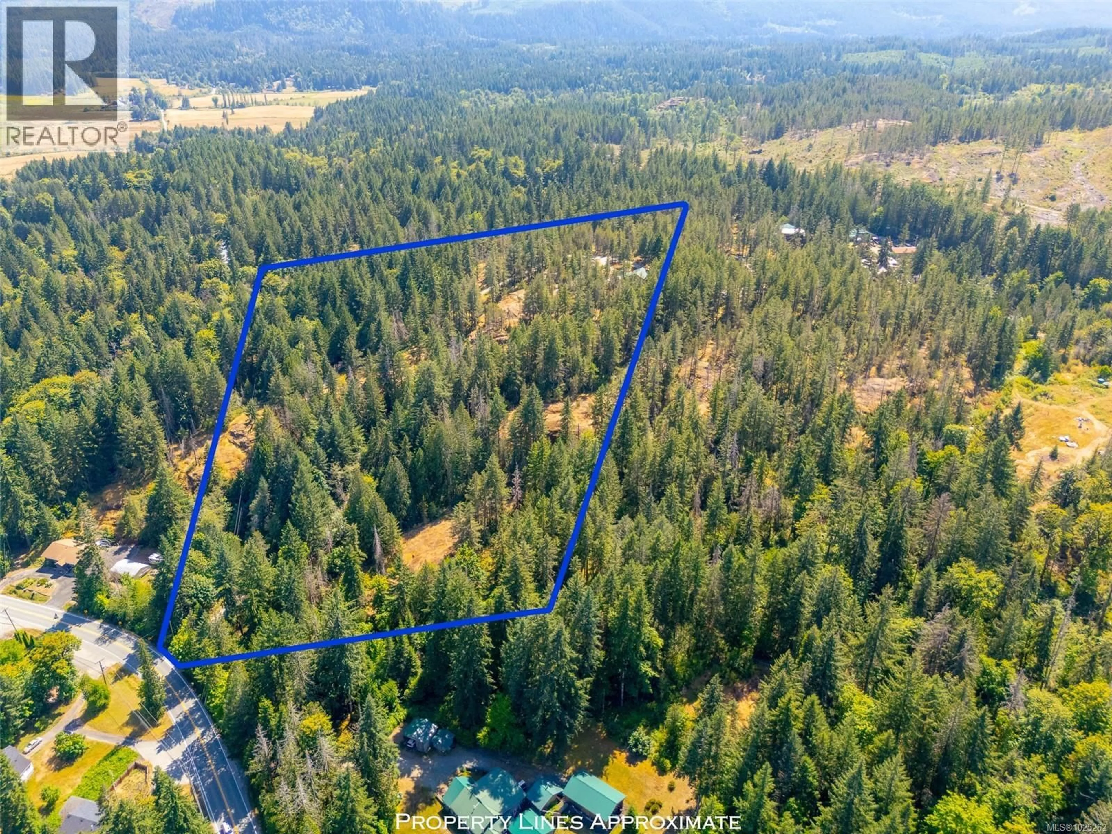 A pic from outside/outdoor area/front of a property/back of a property/a pic from drone, forest/trees view for 7800 PACIFIC RIM HIGHWAY, Port Alberni British Columbia V9Y8Y7