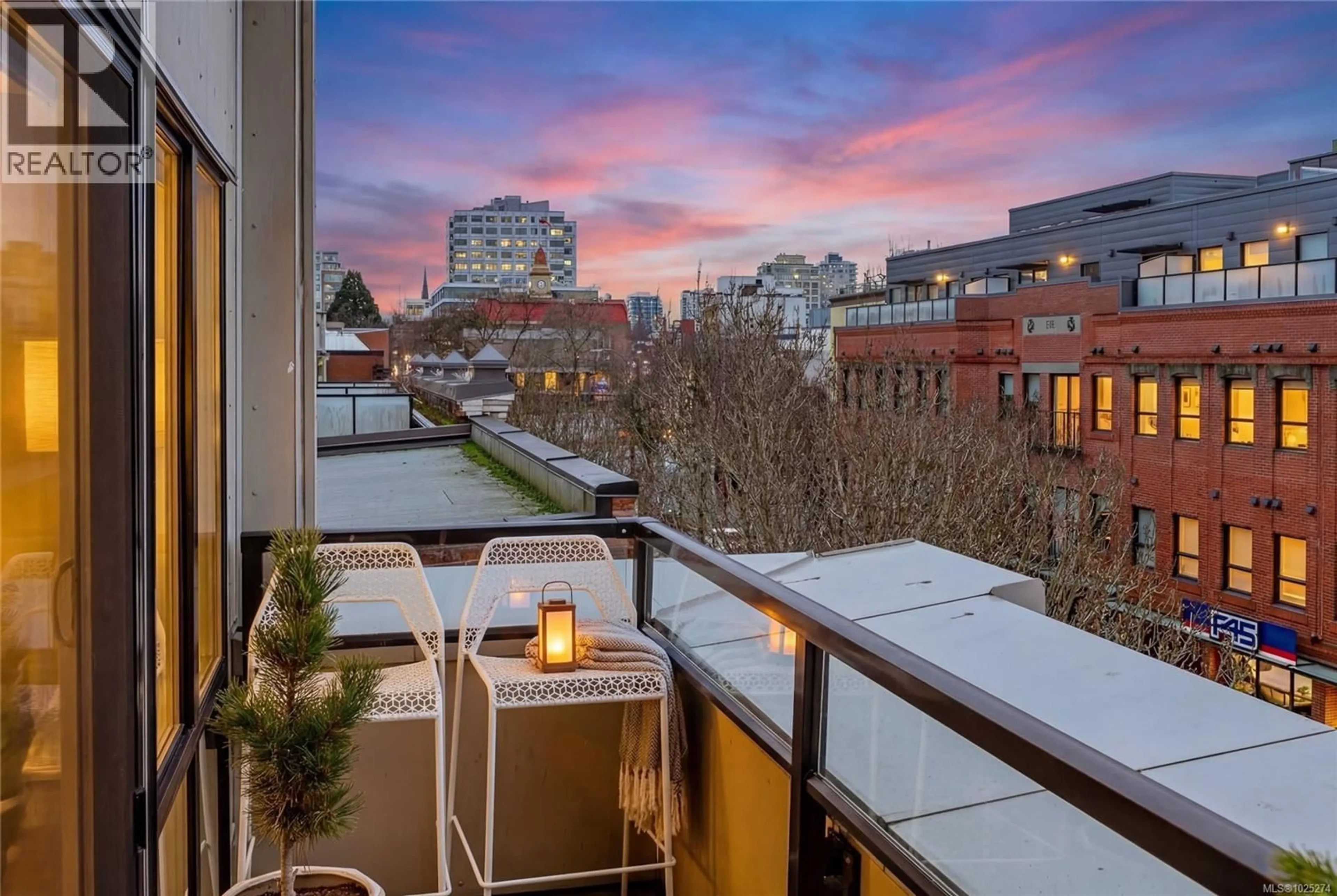 Patio, city buildings view from balcony for 403 - 528 PANDORA AVENUE, Victoria British Columbia V8W0C6