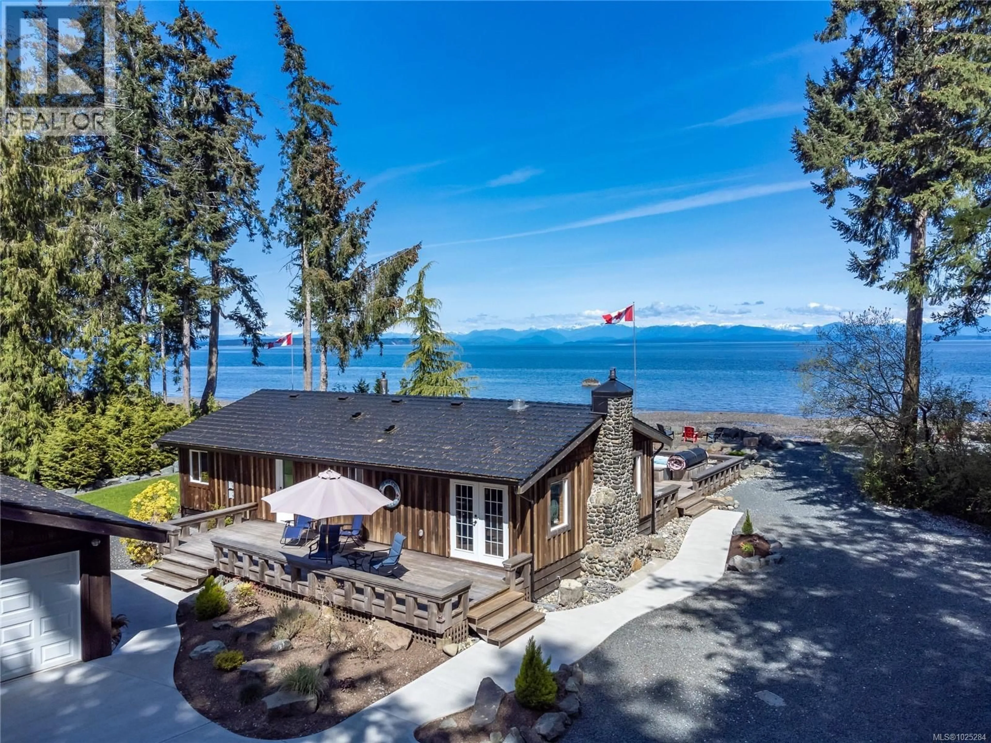 A pic from outside/outdoor area/front of a property/back of a property/a pic from drone, water/lake/river/ocean view for 4113 TWIGG ROAD, Campbell River British Columbia V9H1E9