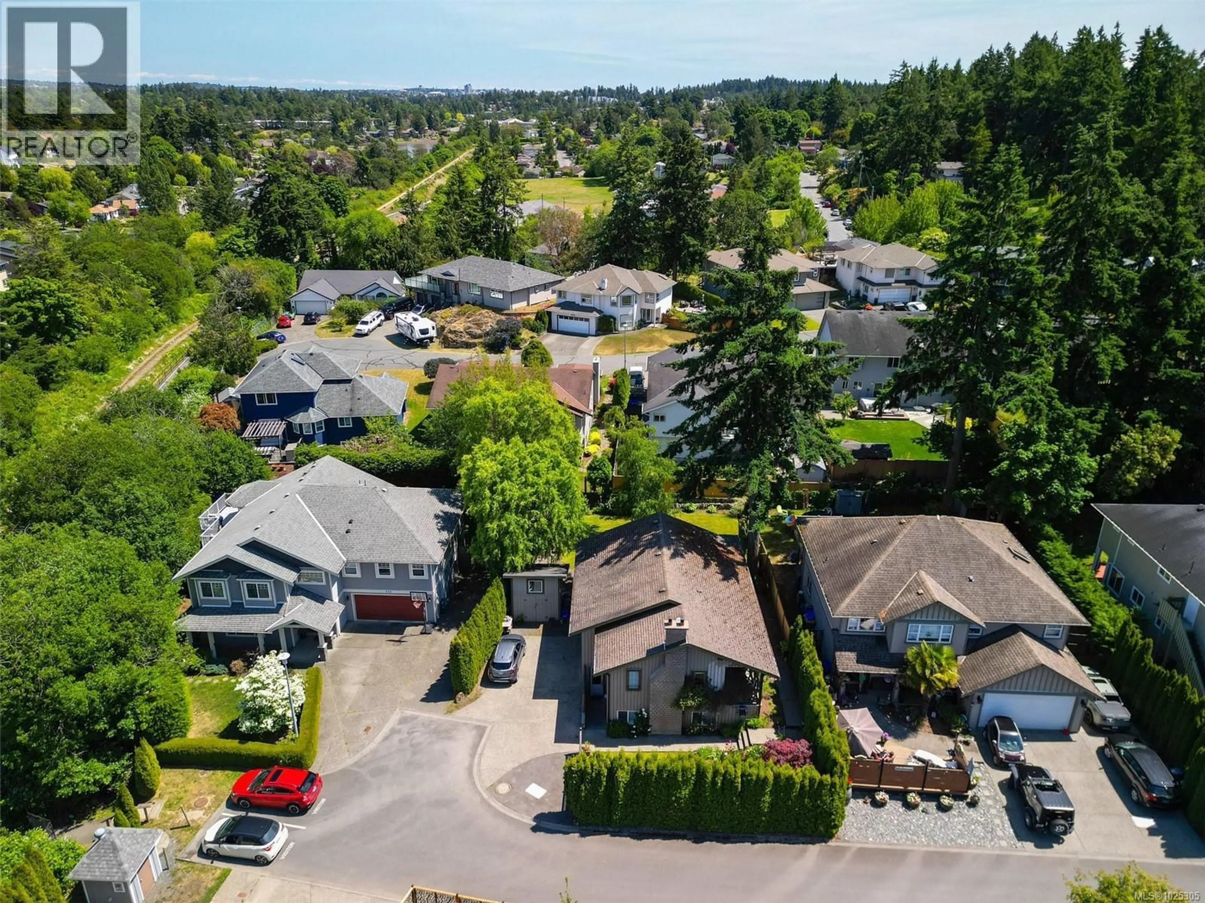 A pic from outside/outdoor area/front of a property/back of a property/a pic from drone, street for 110 JEDBURGH PLACE, View Royal British Columbia V9B6N7