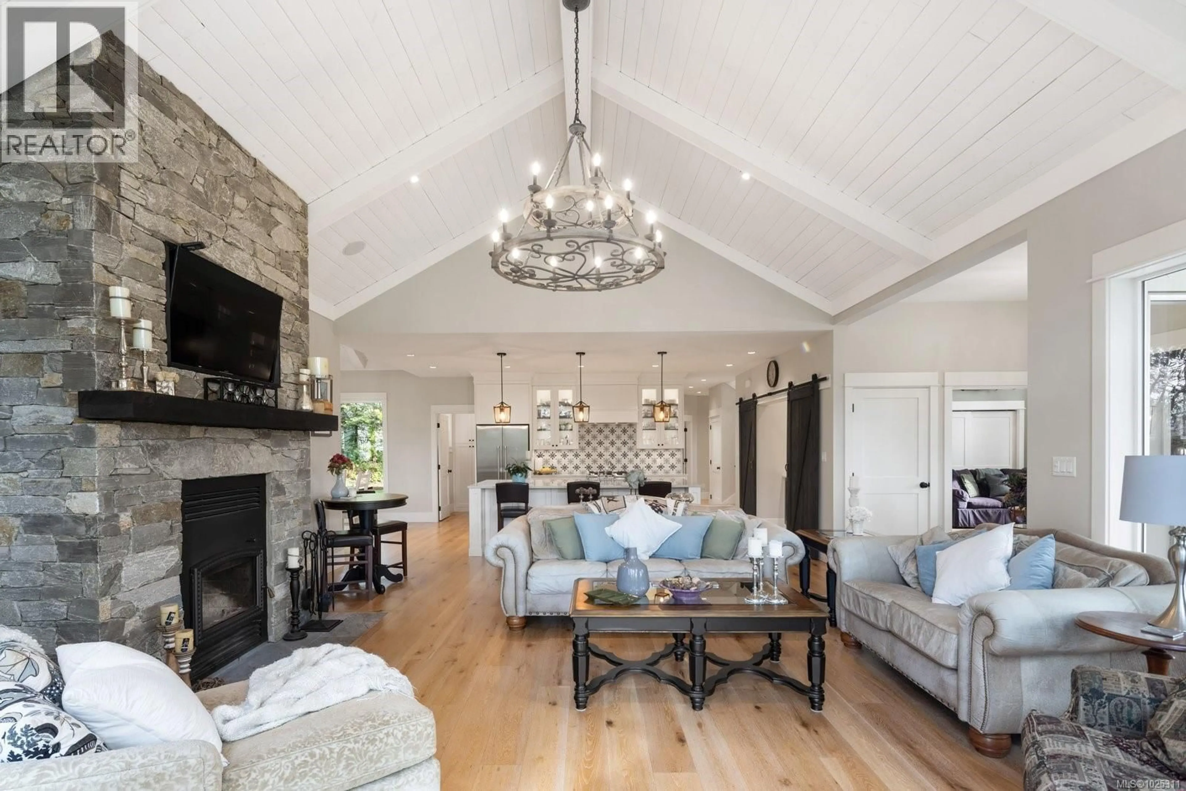 Living room with furniture, wood/laminate floor for 390 WAIN ROAD, North Saanich British Columbia V8L5P9