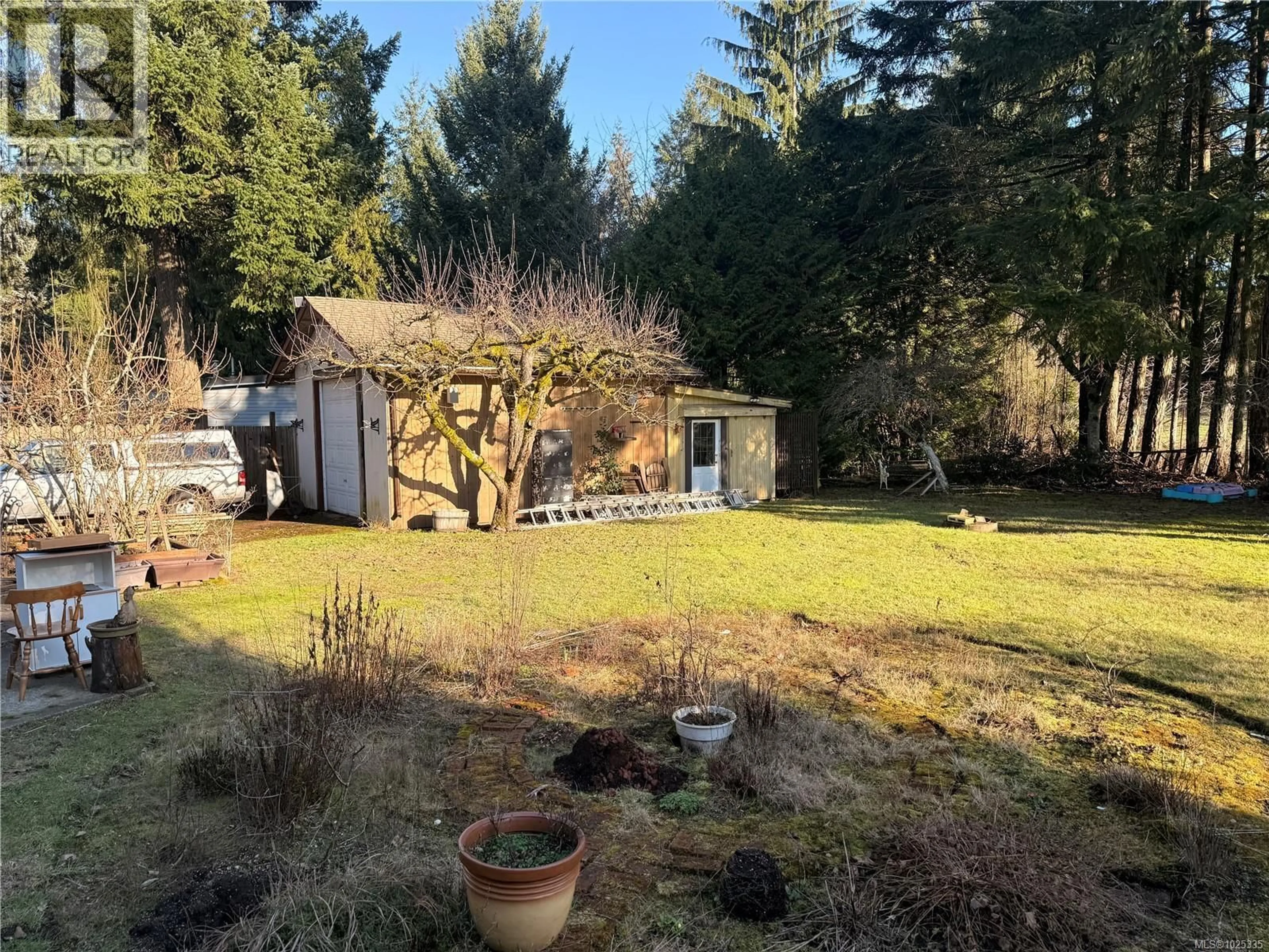 A pic from outside/outdoor area/front of a property/back of a property/a pic from drone, forest/trees view for 6001 PINE PARK PLACE, Nanaimo British Columbia V9T3L2