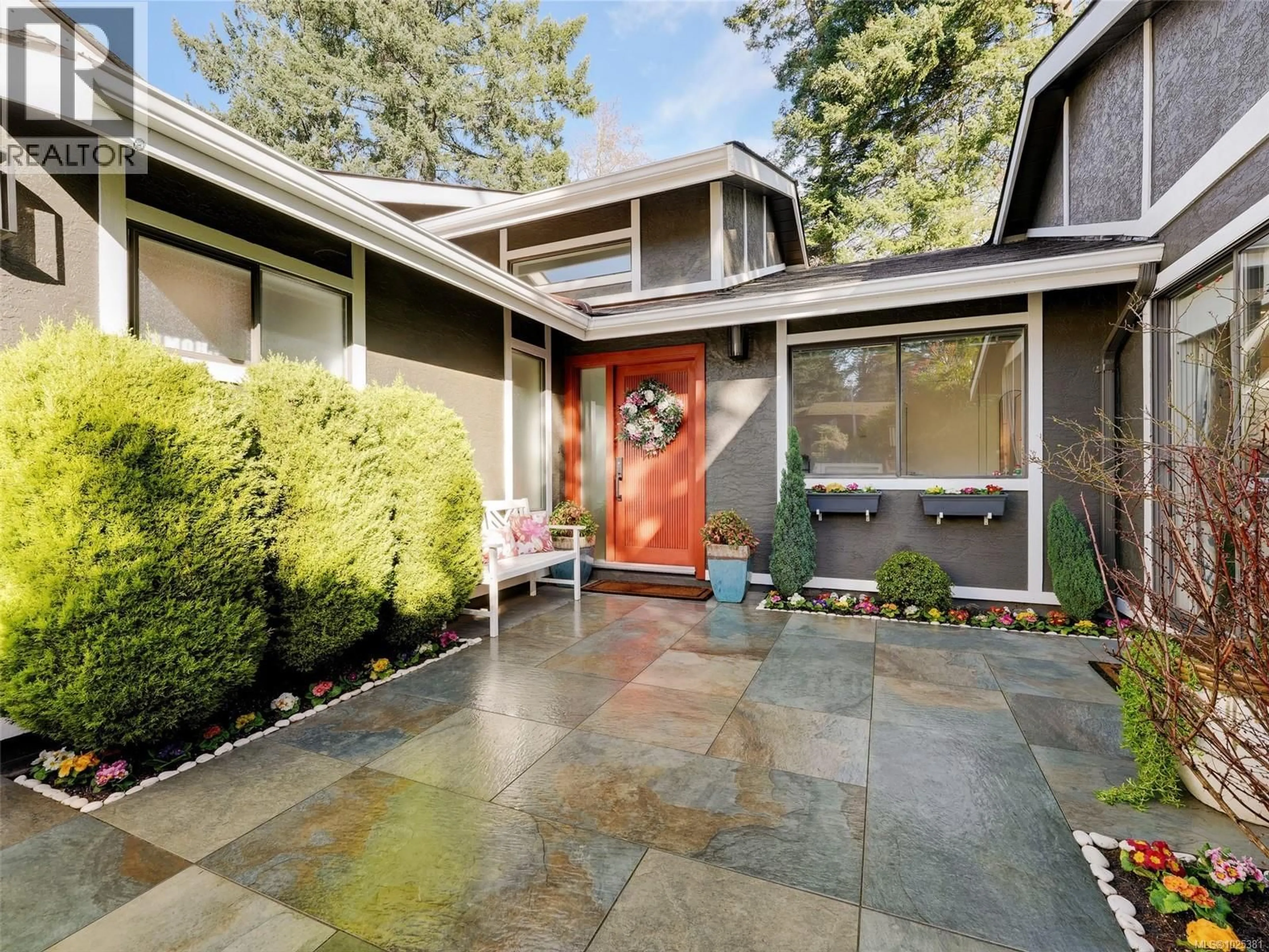 Home with vinyl exterior material, street for 1042 DONWOOD DRIVE, Saanich British Columbia V8X4G3